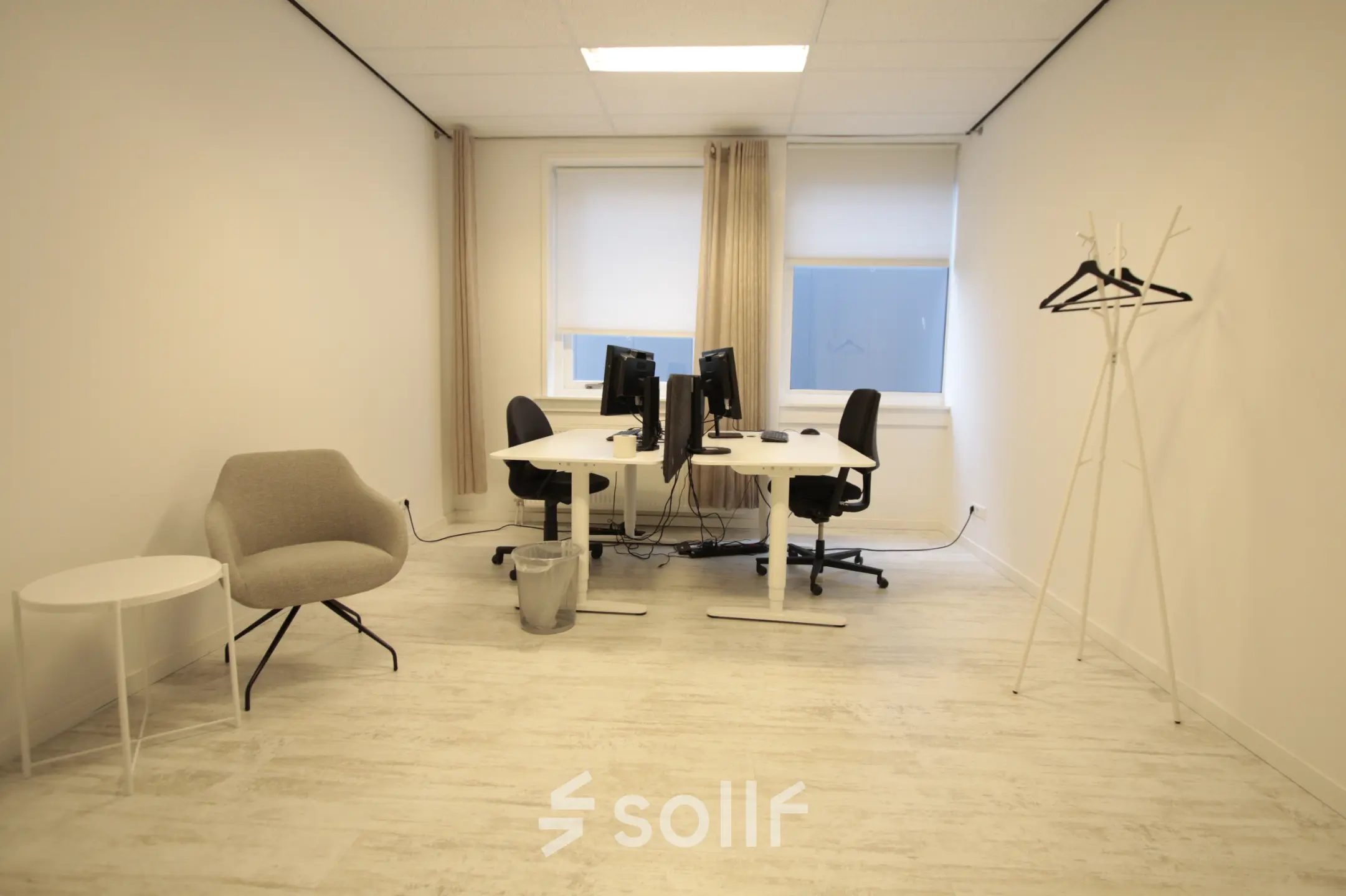 Bright office space at Waarderweg 19, Haarlem Waarderpolder, featuring two workstations with computers, ideal for office space rental.