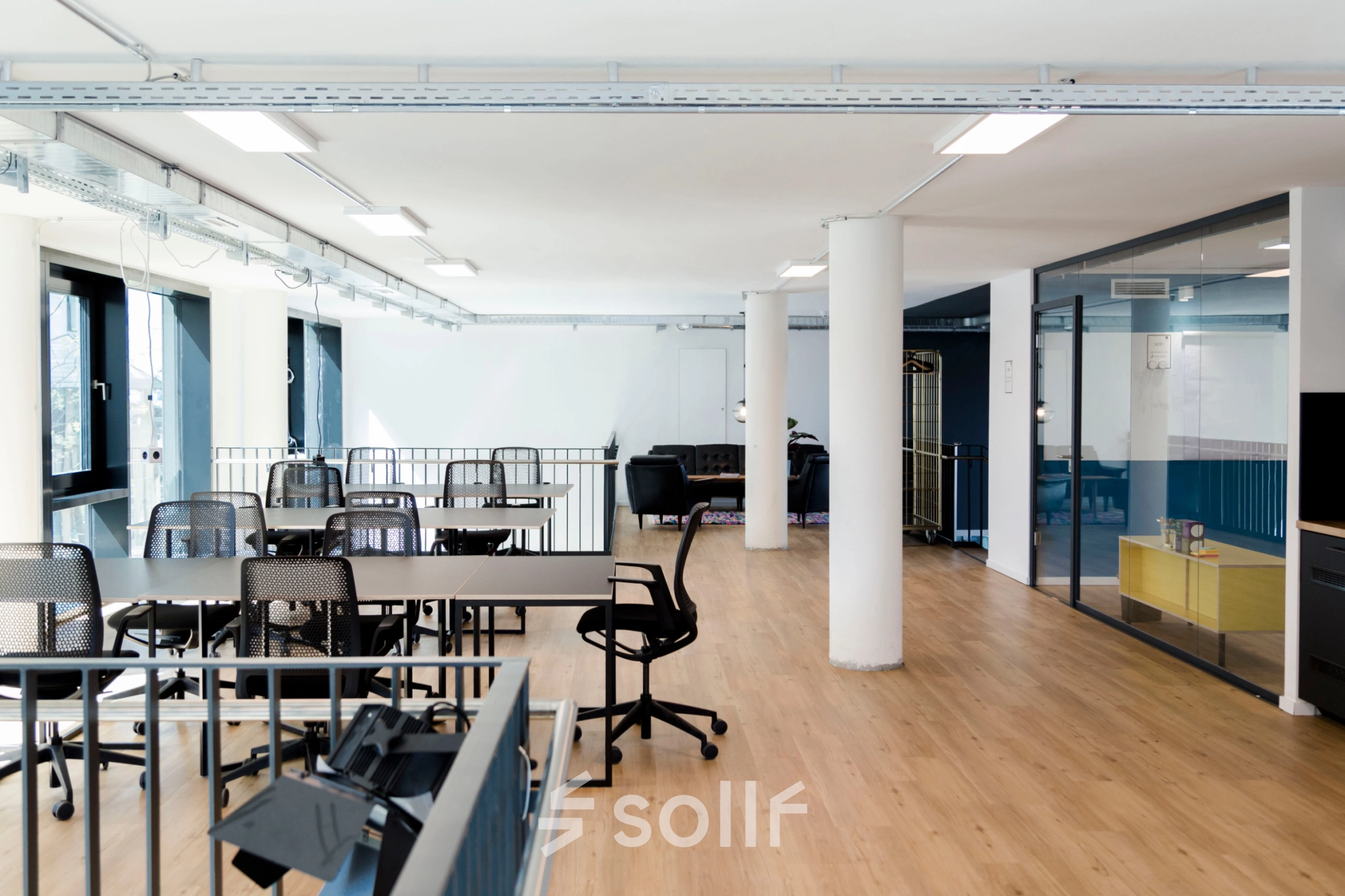 Spacious office space rental at Versmannstraße 4, Hamburg Hafencity, featuring open workstations and a modern interior for productive work.
