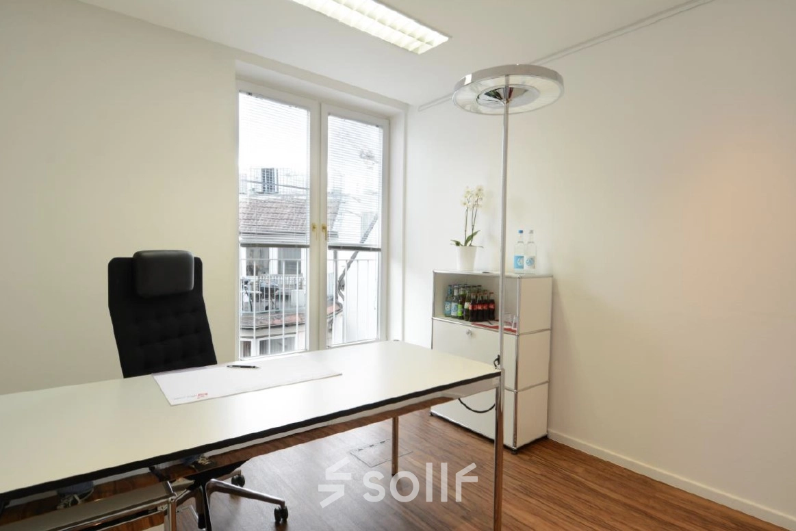Bright office space at Colonnaden 5, Hamburg Neustadt with a desk, chair, and cabinet, ideal for office space rental.
