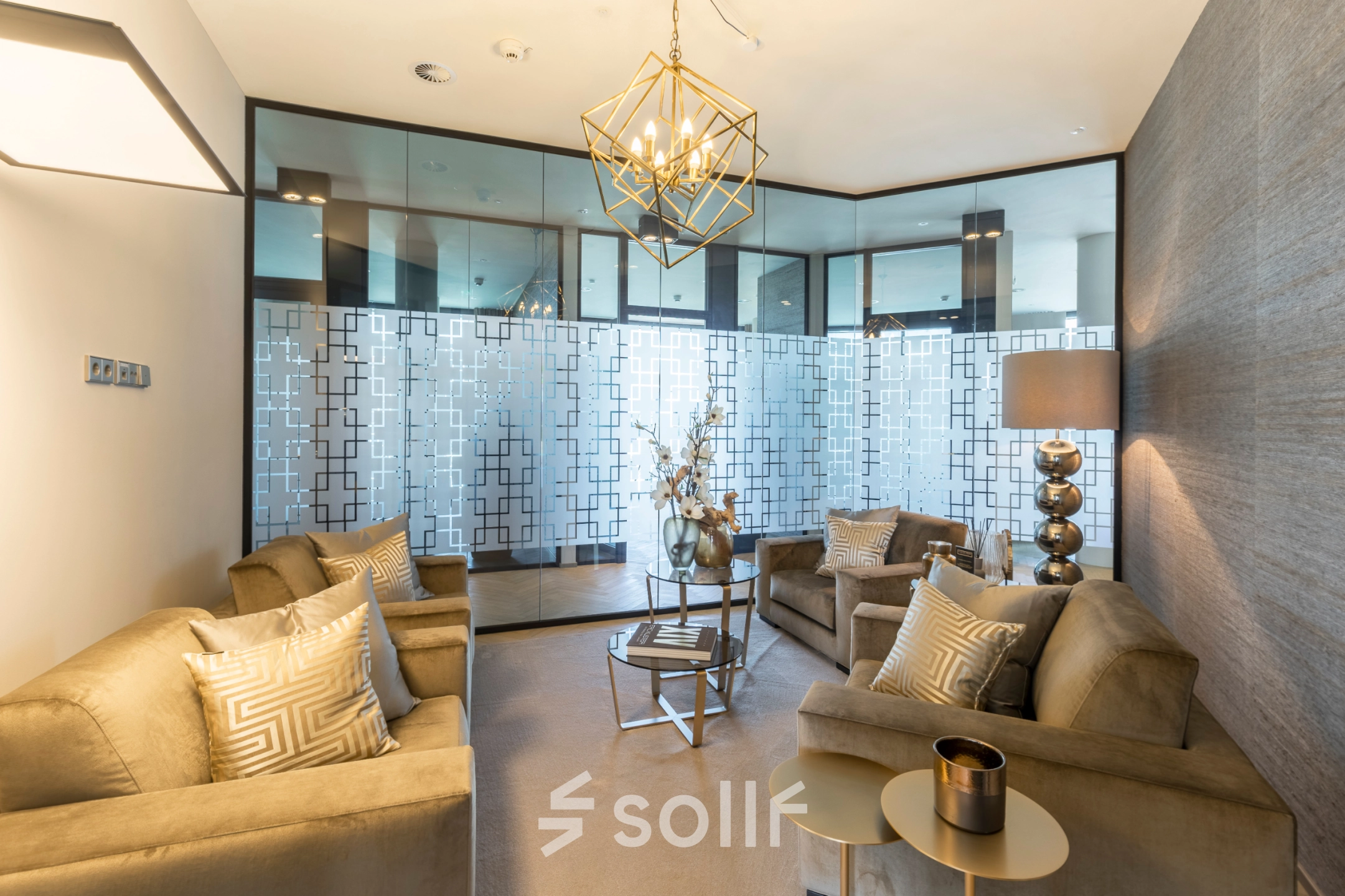 Elegant office space rental at Hohe Bleichen 8, Hamburg Neustadt, featuring stylish seating and a modern chandelier.