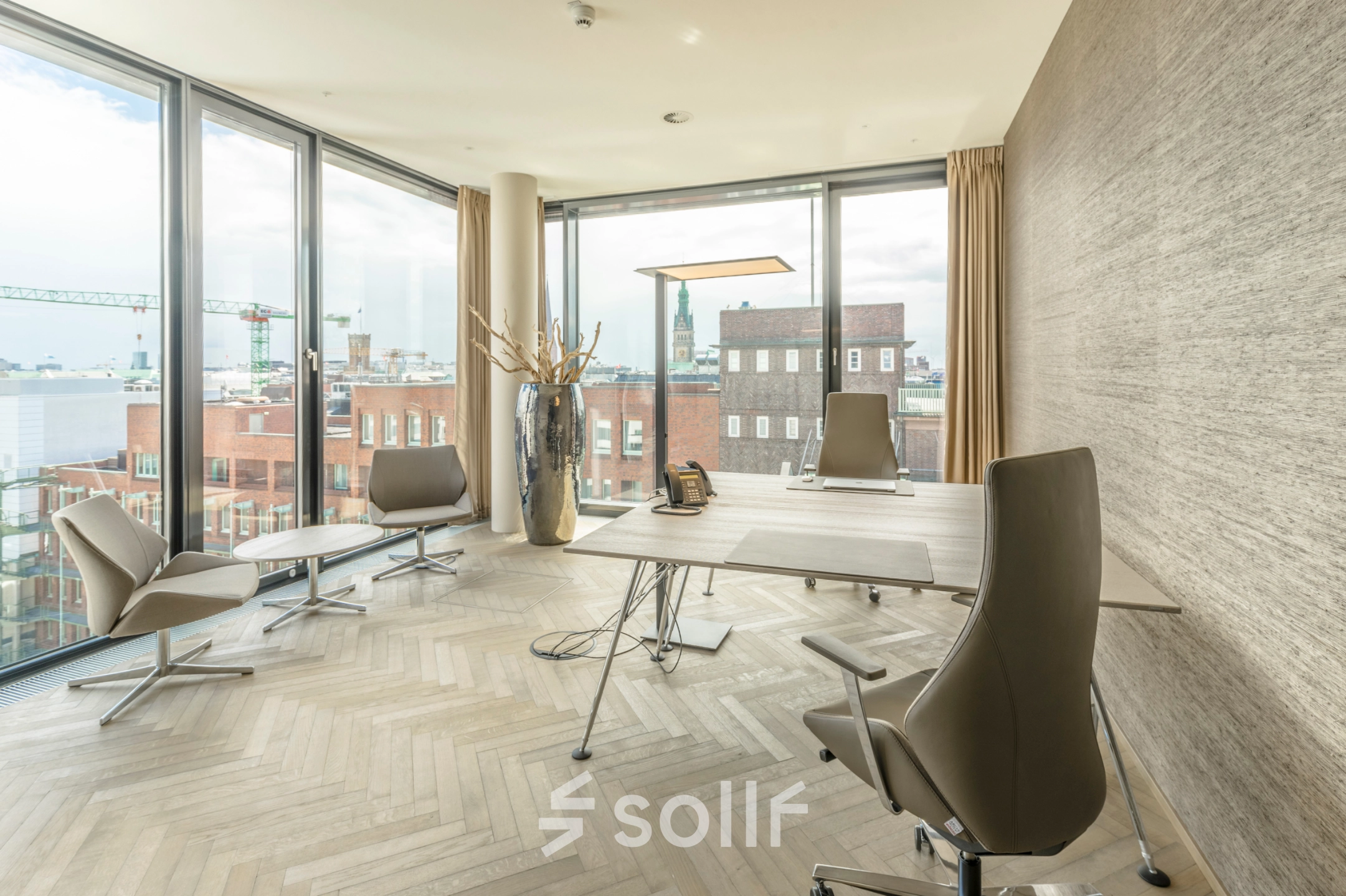 Bright, modern office space with sleek furniture and large windows at Hohe Bleichen 8, Hamburg Neustadt, ideal for office space rental.
