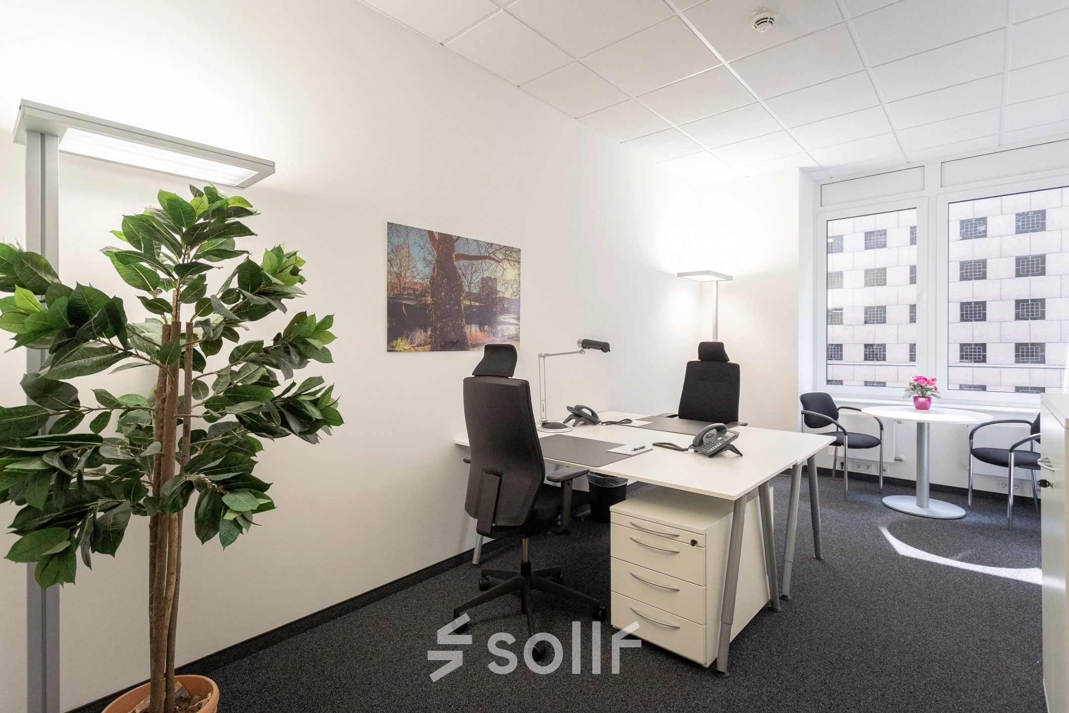 Furnished office space at Raboisen 38, Hamburg Old Town, featuring desks, chairs and office equipment, ideal for office space rental.