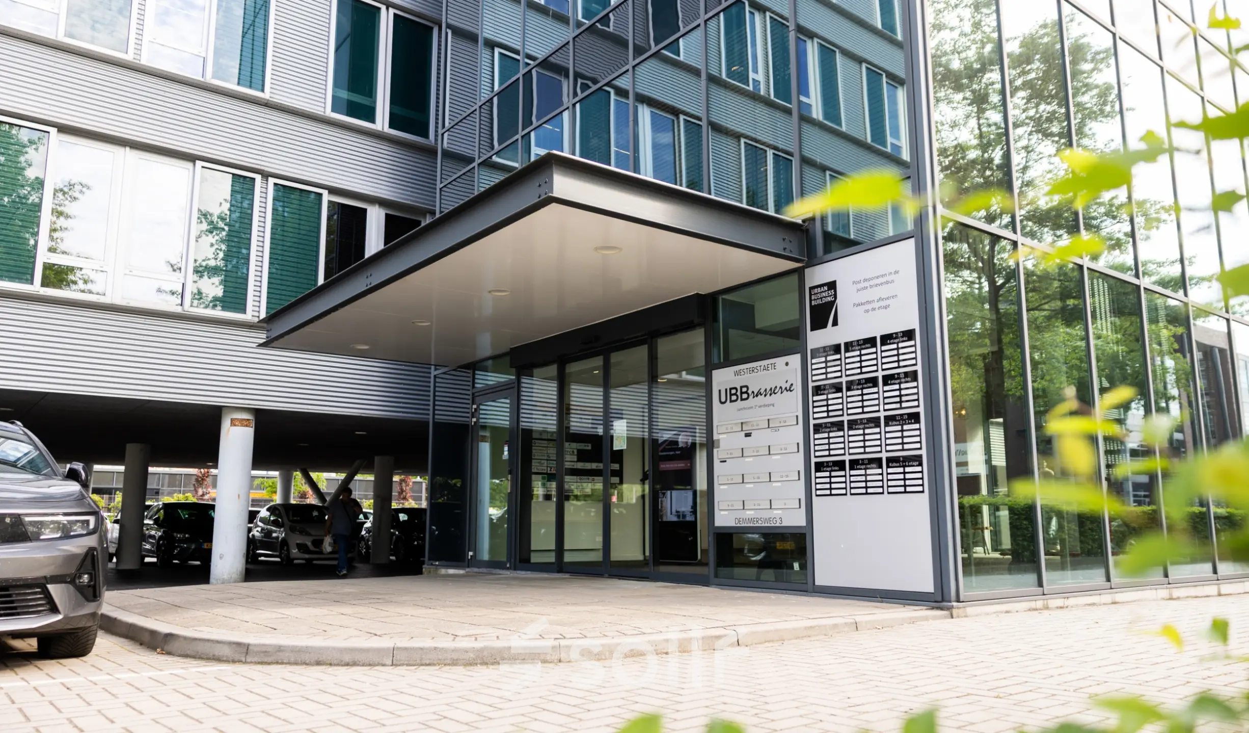 Exterior view of Demmersweg 3 in Hengelo, showcasing a modern office building. Ideal for office space rental opportunities.