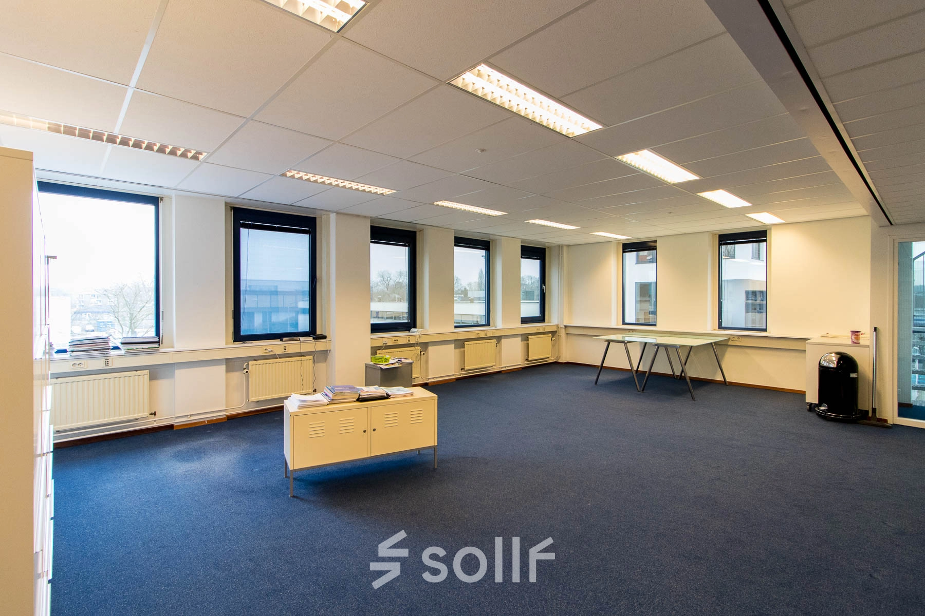Spacious office to rent at Franciscusweg 219, Hilversum, featuring large windows and ample natural light. Ideal for office space rental.
