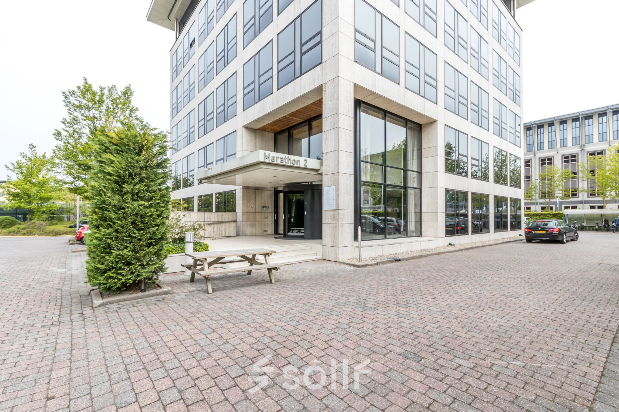 Exterior view of office building at Marathon 2, Hilversum, highlighting its suitability for office space rental.