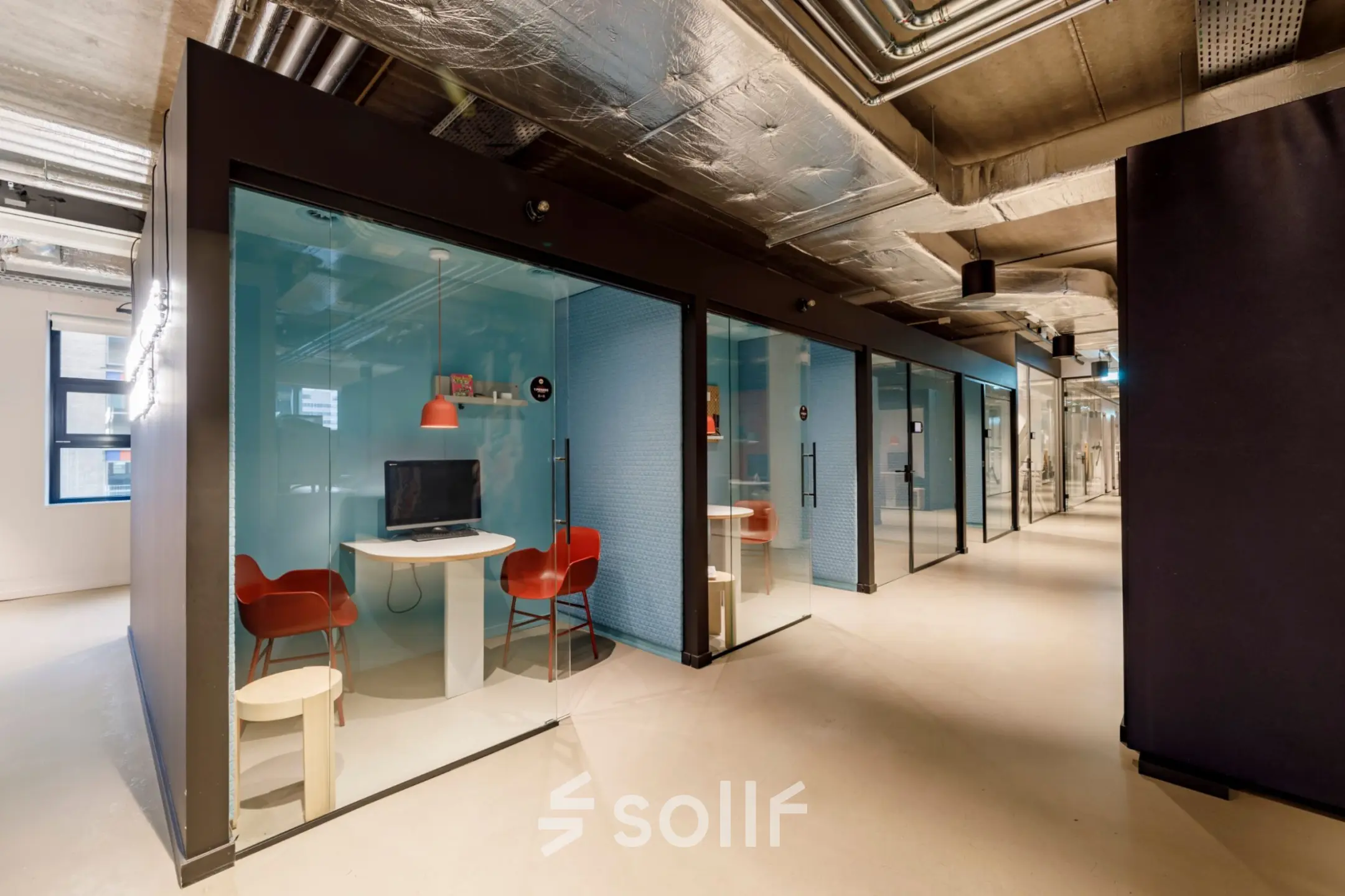 Furnished office space rental with modern workspaces featuring glass-enclosed units at Siriusdreef 16, Hoofddorp.