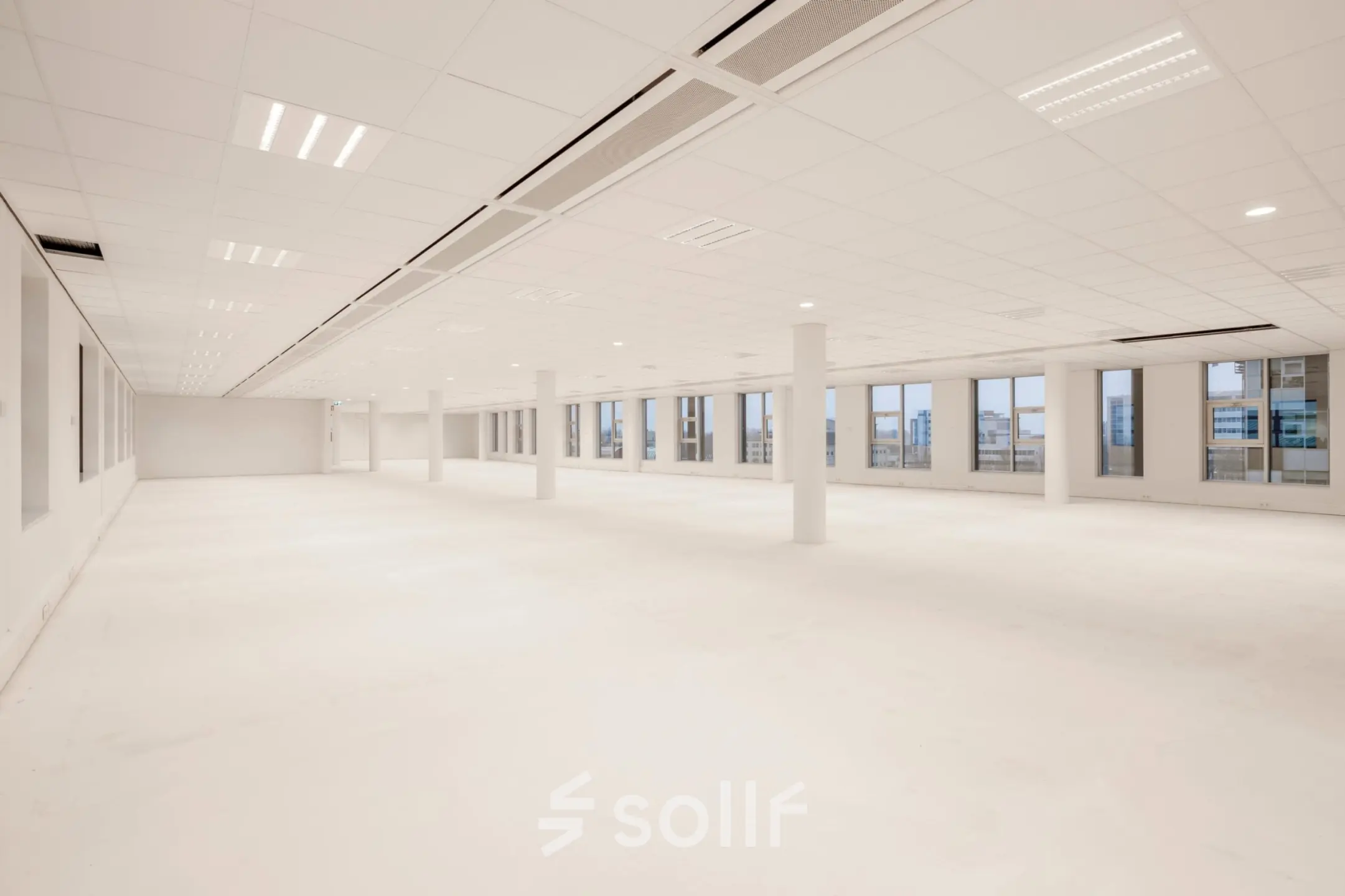 Spacious open office to rent at Siriusdreef 16, Hoofddorp, with large windows offering natural light, ideal for office space rental.