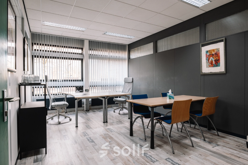 Furnished office space at De Vos van Steenwijklaan 75, Hoogeveen, featuring desks, chairs, and modern decor, ideal for rent office space.