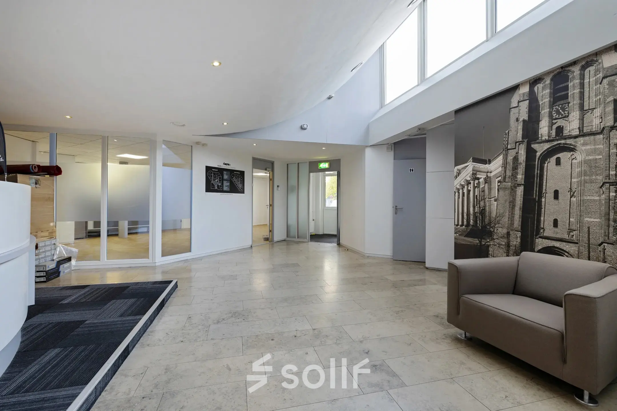 Spacious and modern office interior at Ouddeelstraat 7a in Leeuwarden, featuring sleek design with ample natural light, ideal for those seeking office space rental.