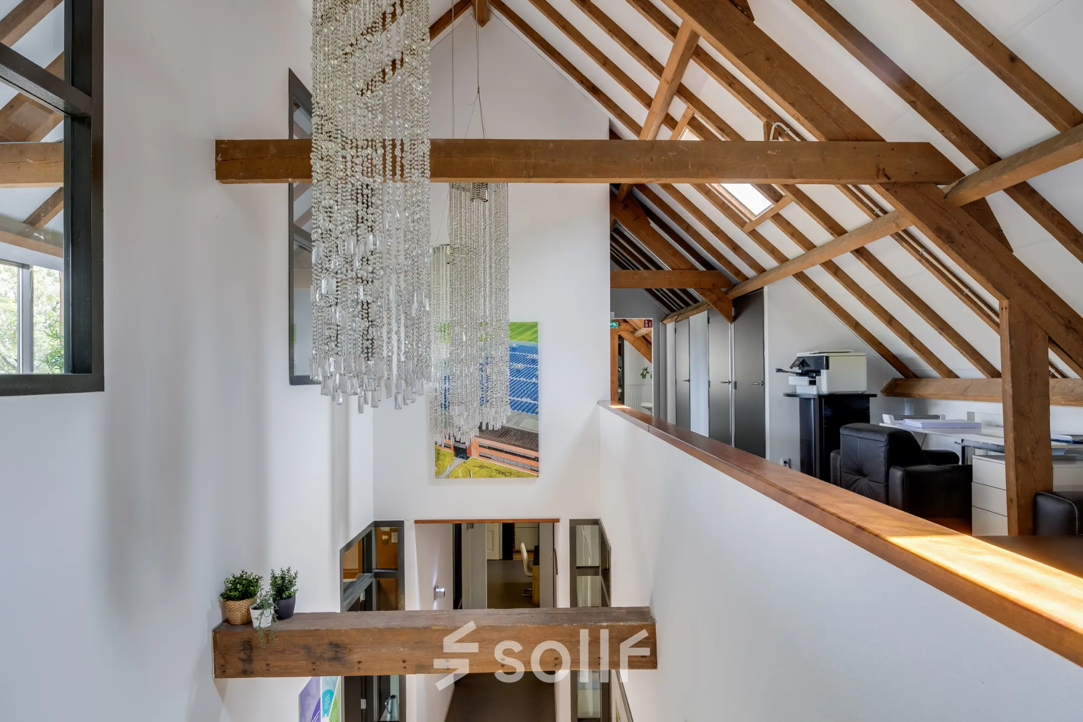 Interior view of Hamersveldseweg 120, Leusden, showcasing an office space rental with modern decor and wooden beams.