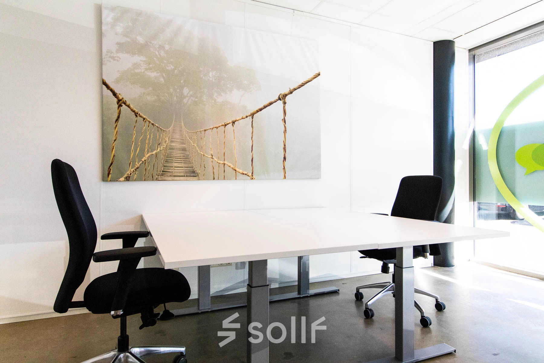 Office to rent at Brieltjenspolder 28, Made, featuring a furnished workspace with two chairs around a white table, suitable for business activities.