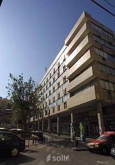 Exterior view of the office building at Plaza Santa María Soledad Torres Acosta 1, Madrid Center, ideal for office space rental.