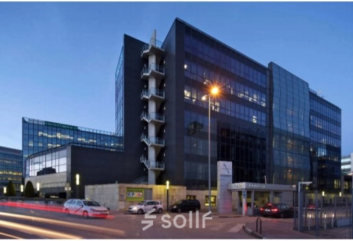 Modern office building exterior located at Calle Vía de los Poblados 3 in Madrid Hortaleza, suitable for office space rental.