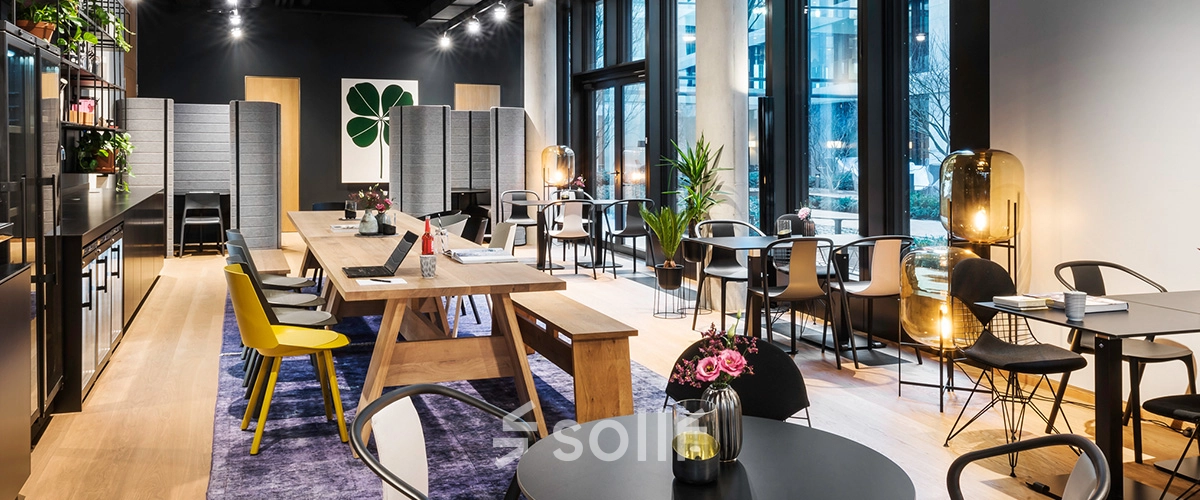 Chic office space available for rent at Rosenheimer Straße 143C, München Werksviertel, featuring modern furnishings and vibrant decor, ideal for workspaces.
