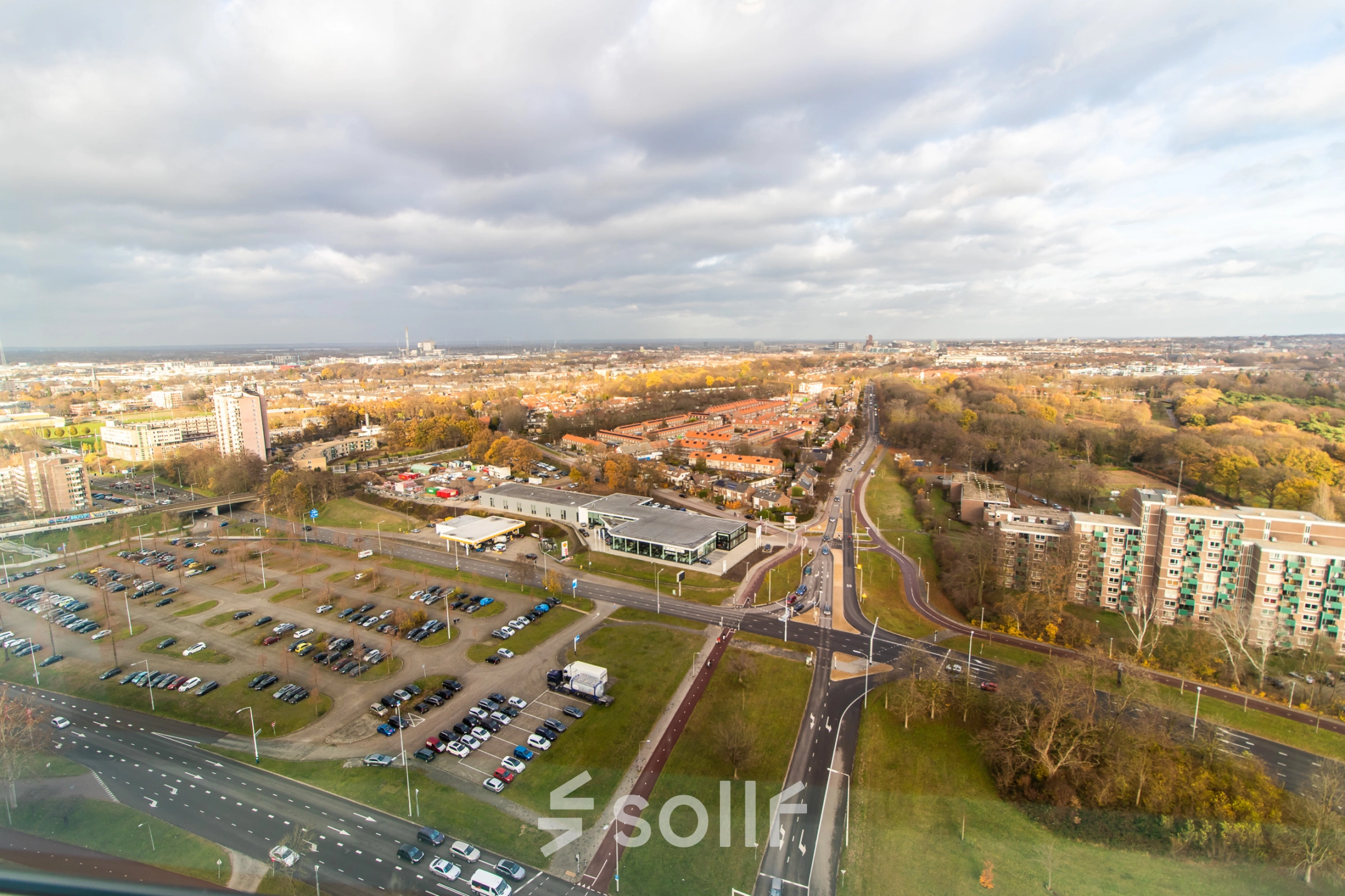 Aerial view of Jonkerbosplein 52 in Nijmegen, showcasing surrounding roads and parking areas.