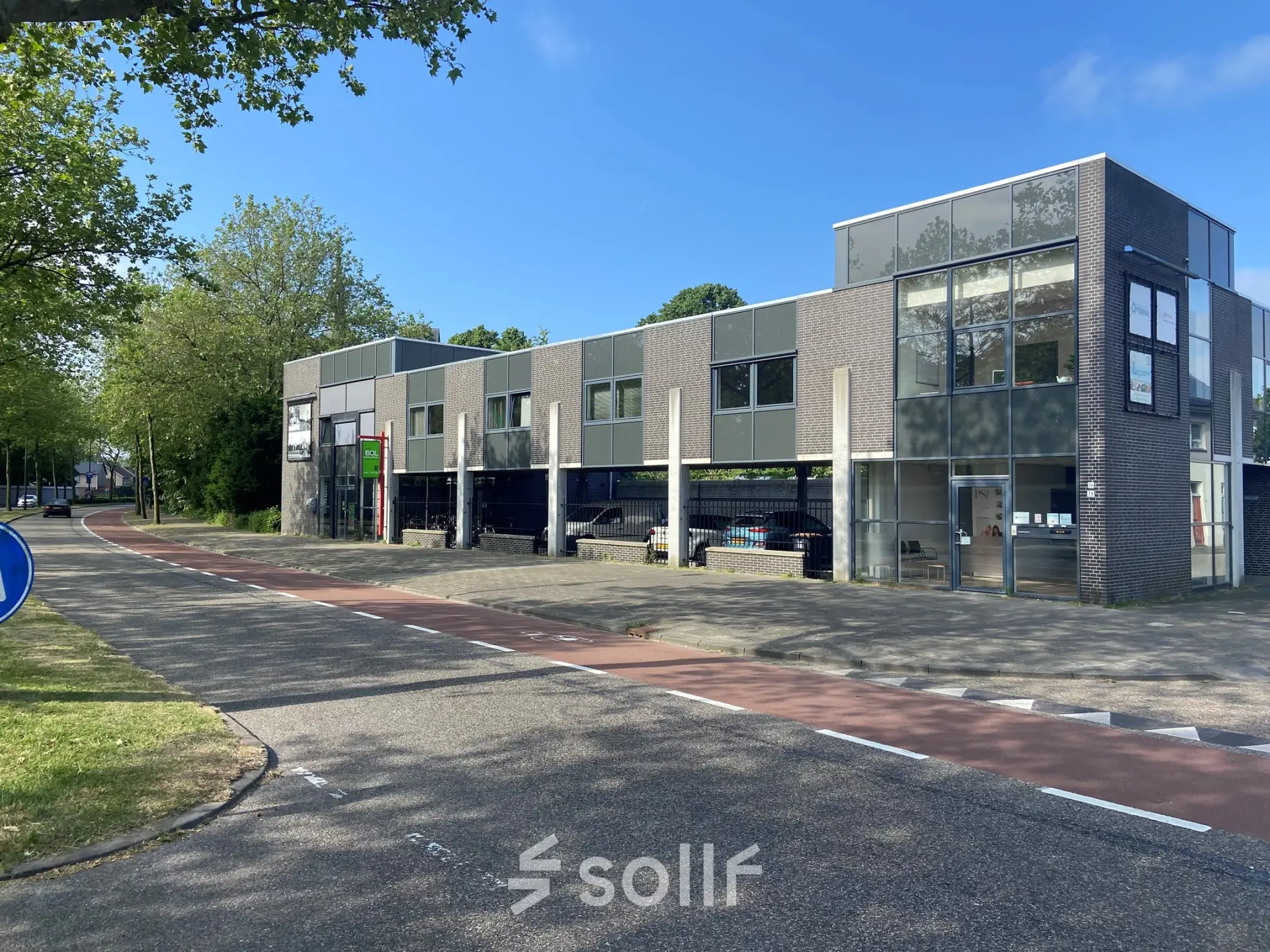 Modern office building at Abdis van Thornstraat 74, Oosterhout Nb, available for office space rental with large windows and a sleek exterior design.