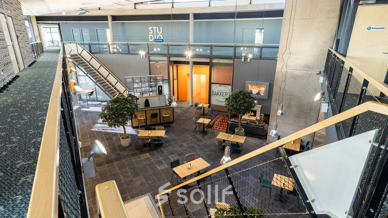 Spacious and modern office space in Oosterwolde with multiple workstations and a contemporary design, ideal for office space rental.