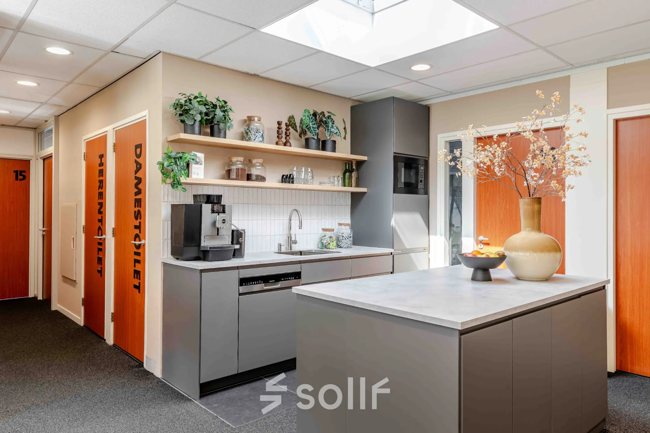 Modern pantry area in an office space at Leeghwaterstraat 25, Reeuwijk, available for rent with sleek design and contemporary amenities.