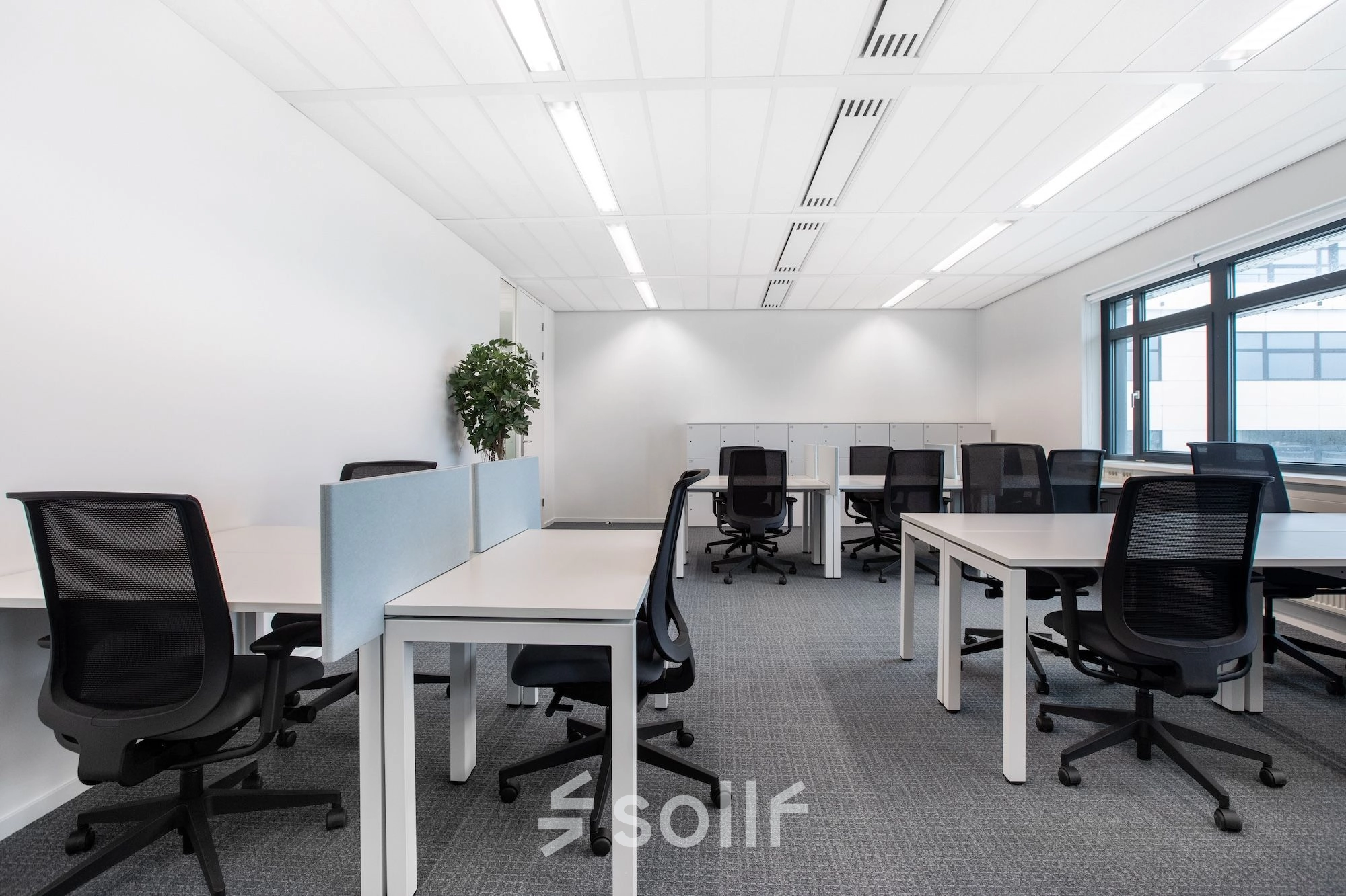 Modern office space for rent at Einsteinlaan 28, Rijswijk, featuring an open floor plan with desks and chairs, ideal for office space rental.