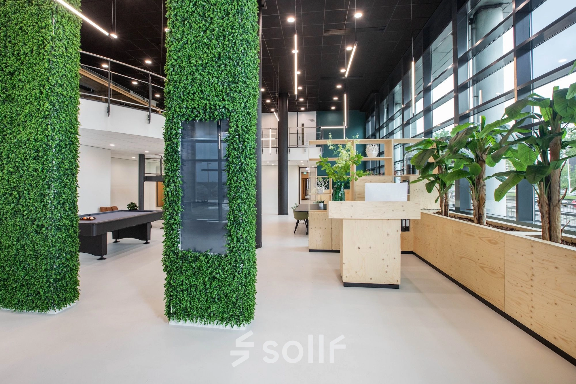 Green and modern office space at Einsteinlaan 28, Rijswijk, featuring greenery and sleek, minimalistic design for office space rental.