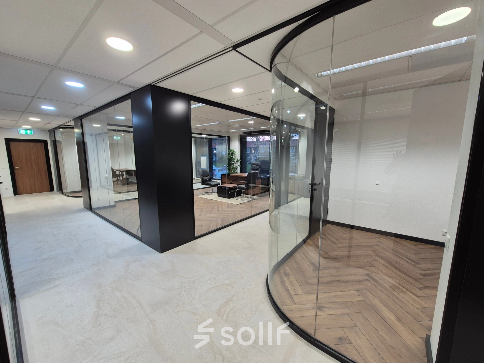Modern office space at JC van Markenlaan 3, Rijswijk showcasing sleek glass walls and minimalist design ideal for office space rental.