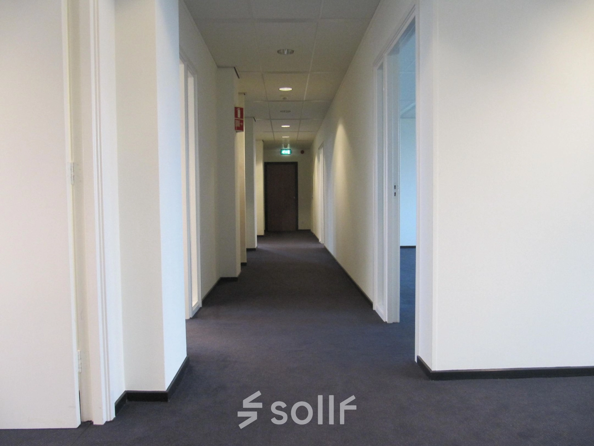 Hallway in an office building at JC van Markenlaan 3, Rijswijk, suitable for office space rental.
