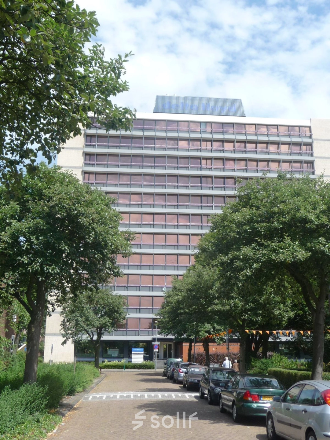 Exterior view of the office building at J.C. van Markenlaan 3 in Rijswijk, ideal for office space rental with adjacent parking.