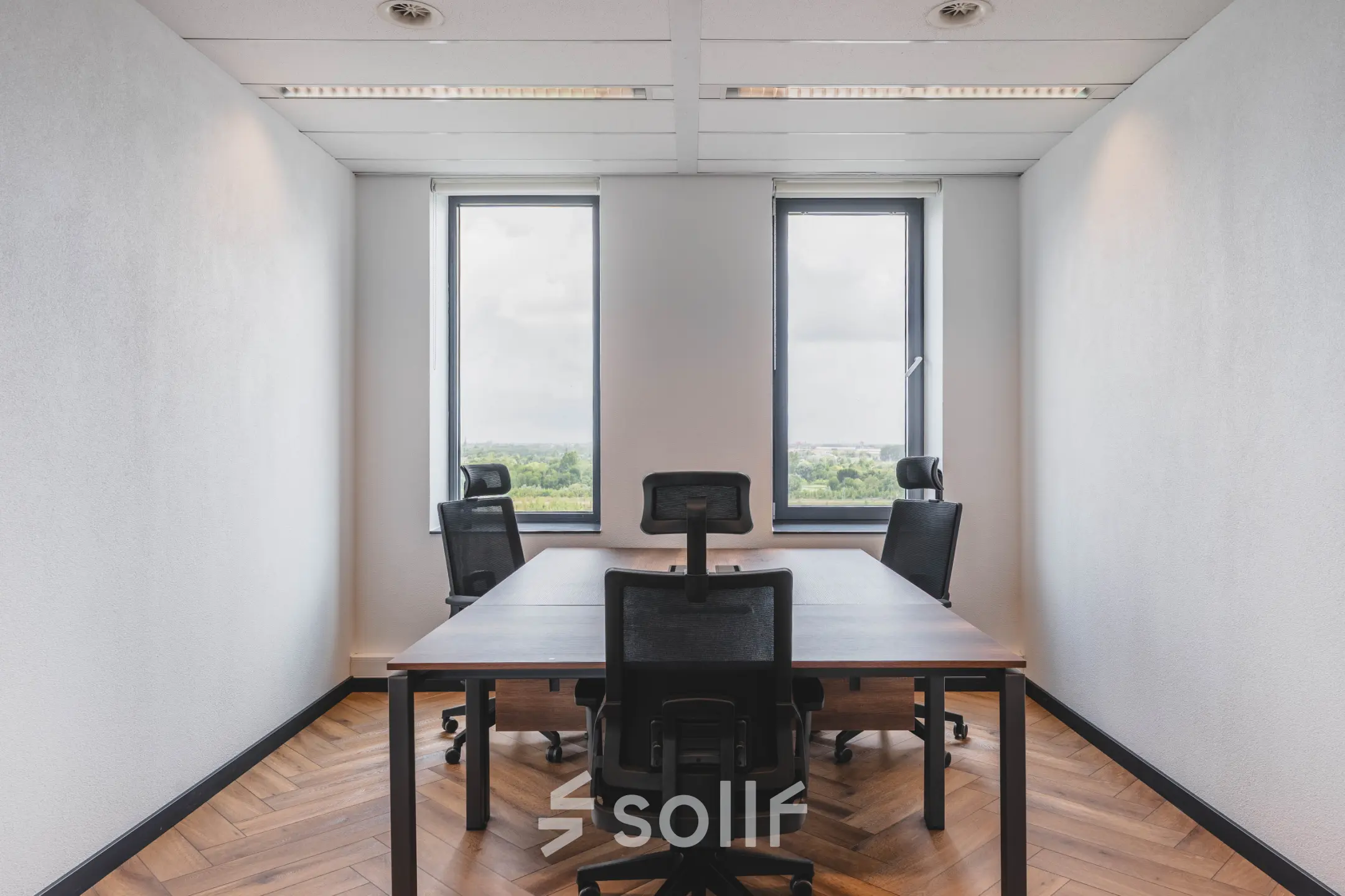 Office space at Laan van Zuid Hoorn 70, Rijswijk featuring a furnished room with modern chairs and a wooden table, ideal for office space rental.
