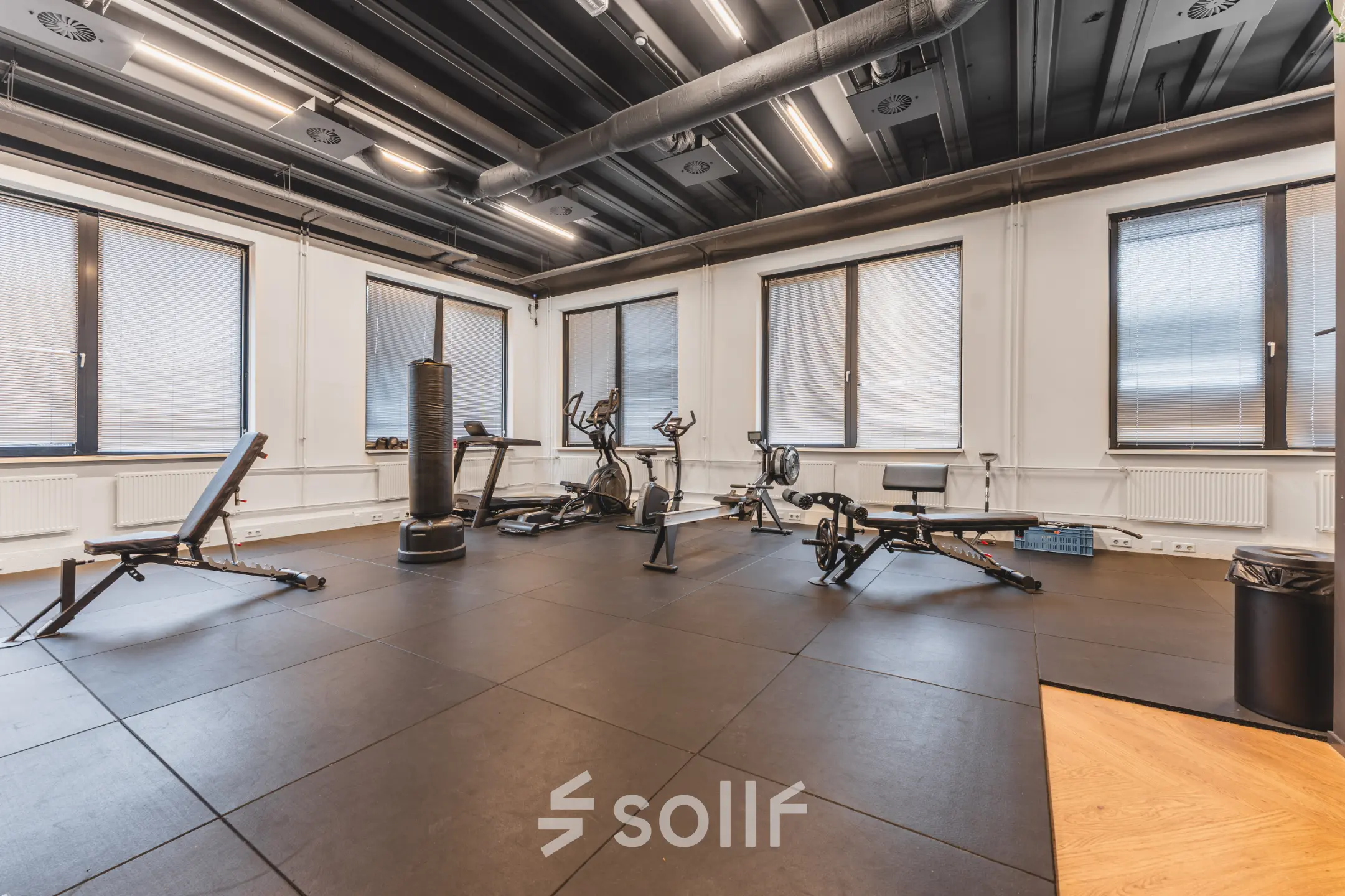 Spacious gym with exercise equipment at Lange Kleiweg 50-62 in Rijswijk, ideal for office space rental.