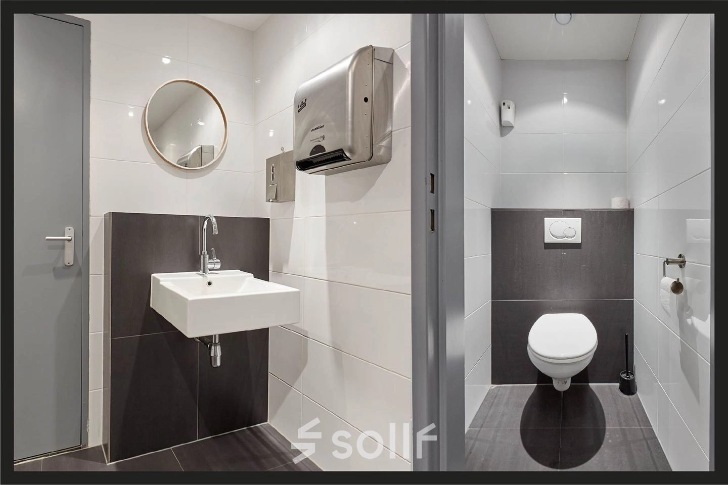 Rijswijk office space rental at Patrijsweg 62, featuring a modern restroom with sleek fixtures and tiled surfaces.