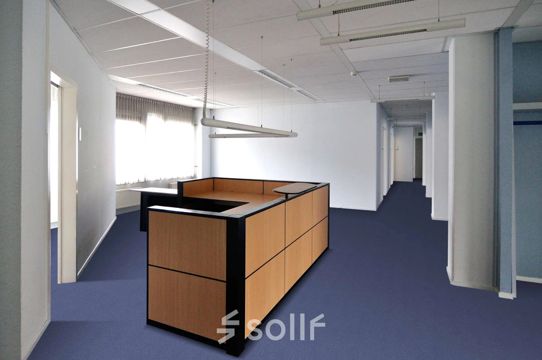 Interior view of office space available for rent at Laan van Brabant 70-86, Roosendaal. The room features a central wooden partition with overhead lighting, ideal for storage or flexible office space rental.