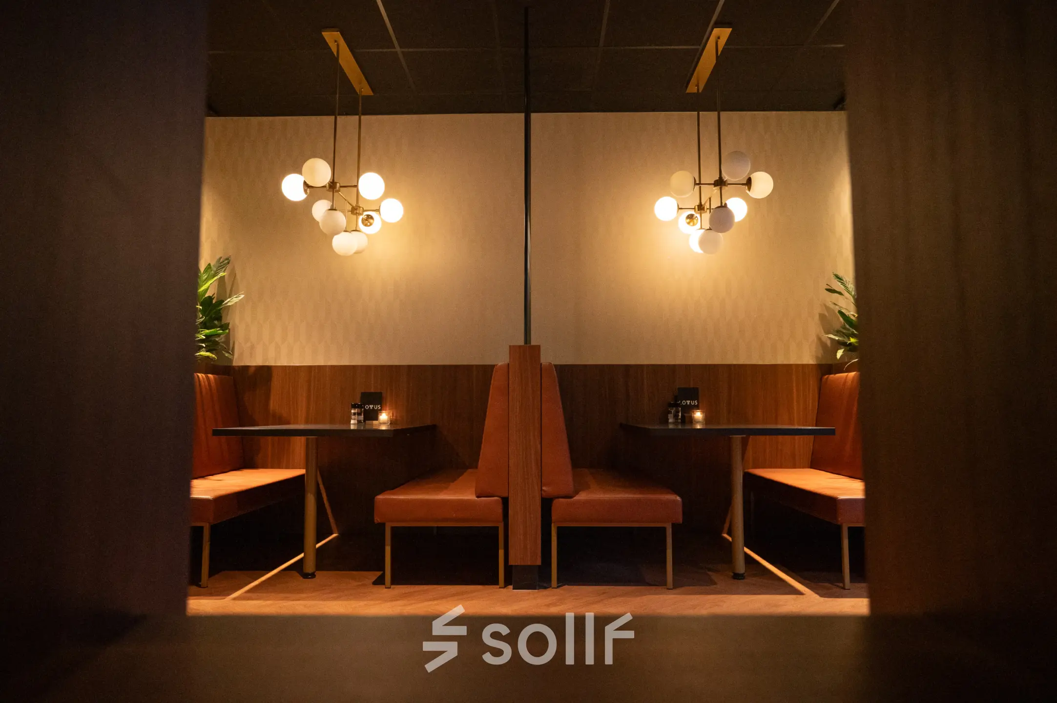 Cozy office space available for rent featuring intimate seating areas with stylish lighting and decor at George Hintzenweg 77-89 in Rotterdam Alexander.