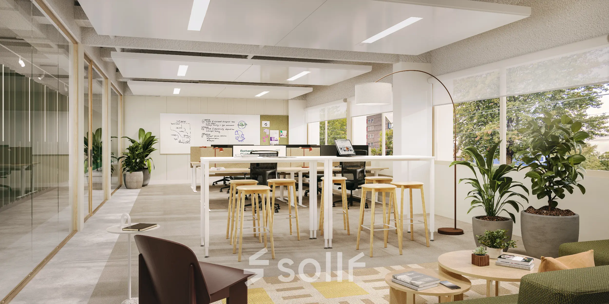 Bright office space in Rotterdam Alexander with modern furnishings, including a high table and stools, surrounded by large windows and greenery. Ideal for office space rental.