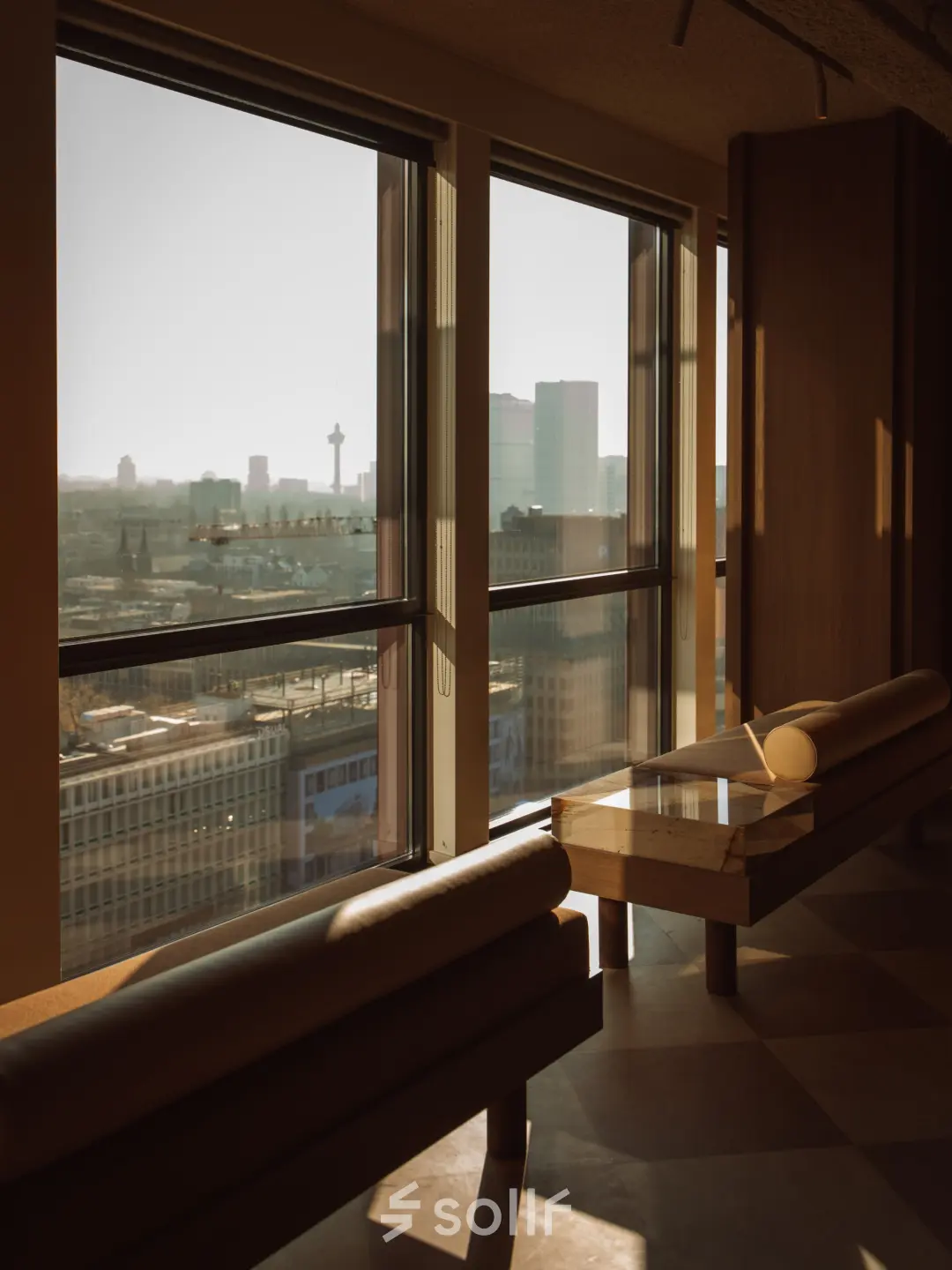 Office at Coolsingel 139 in Rotterdam Center offers expansive windows with city views, ideal for office space rental.