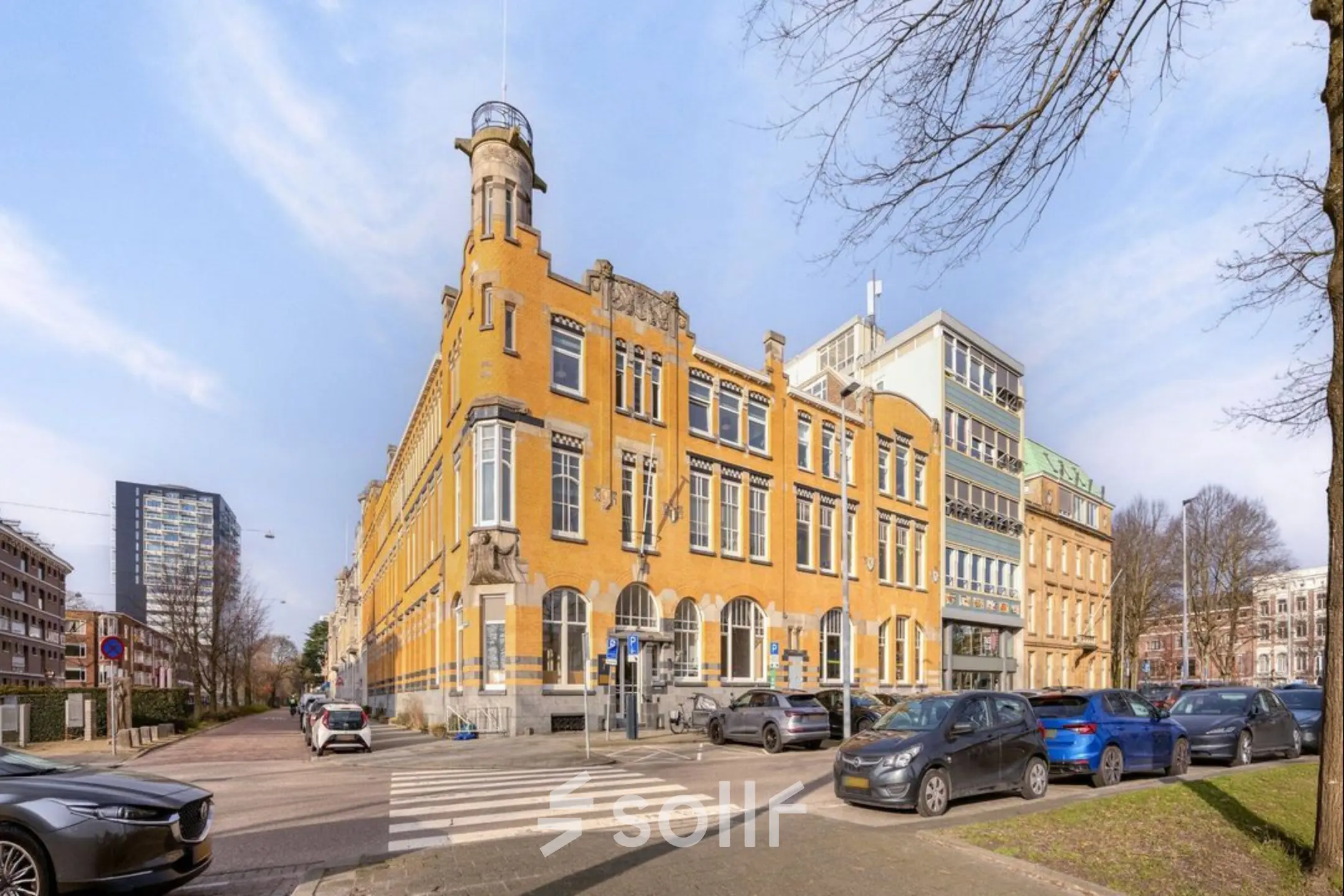 Exterior view of a historic office building at Veerhaven 7, Rotterdam Center, suitable for office space rental with available parking.
