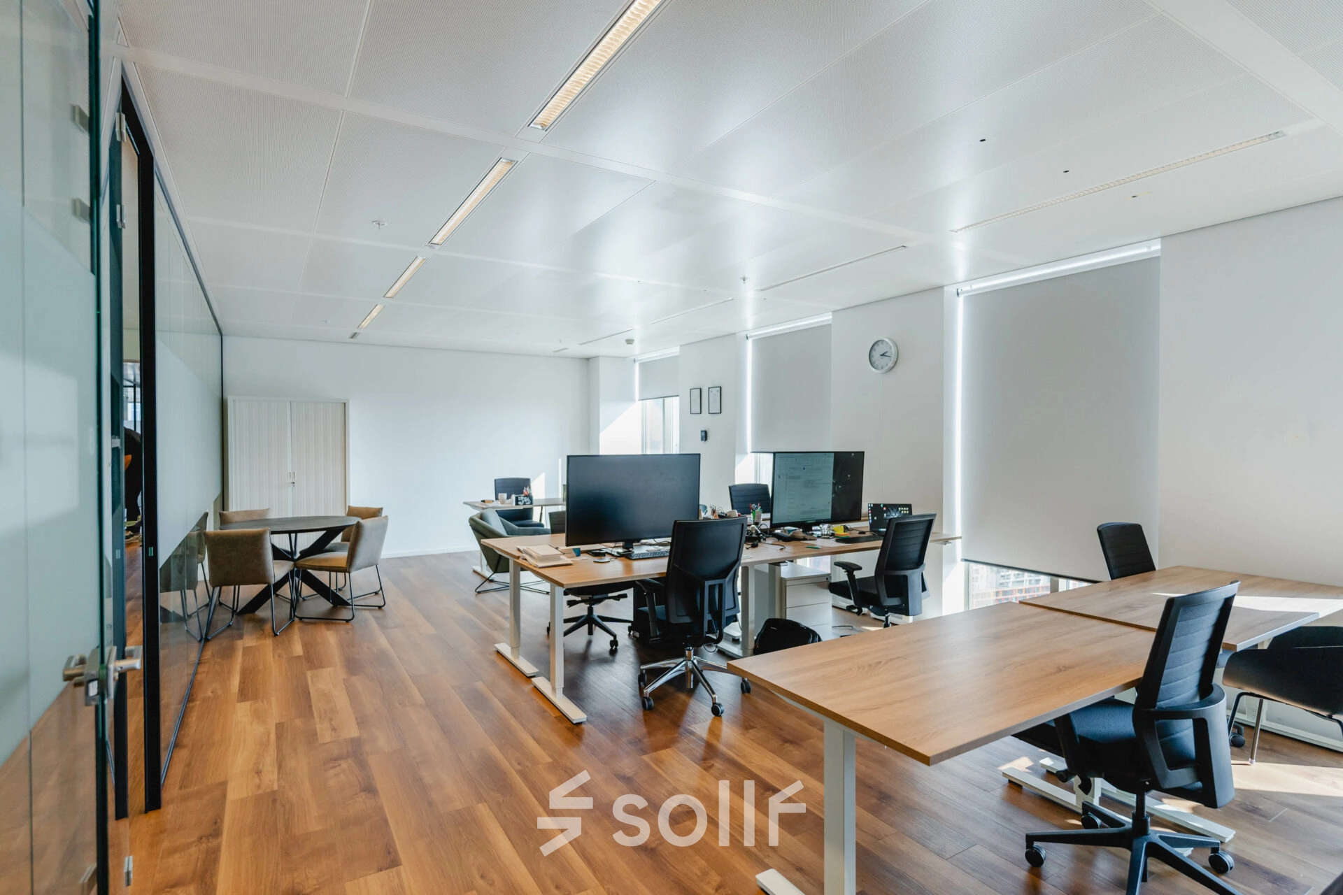 Furnished office space at Weena 788, Rotterdam Center, available for rent. The interior includes desks and chairs, perfect for workspace rental needs.