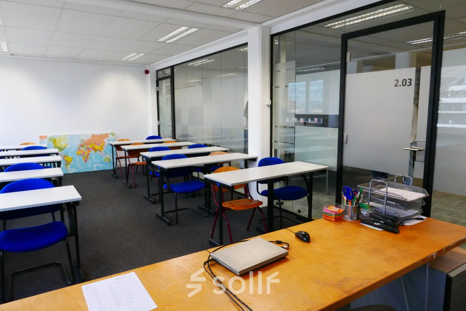 Office space for rent at Wijnhaven 76 in Rotterdam Center with desks and chairs, ideal for workspace rental.