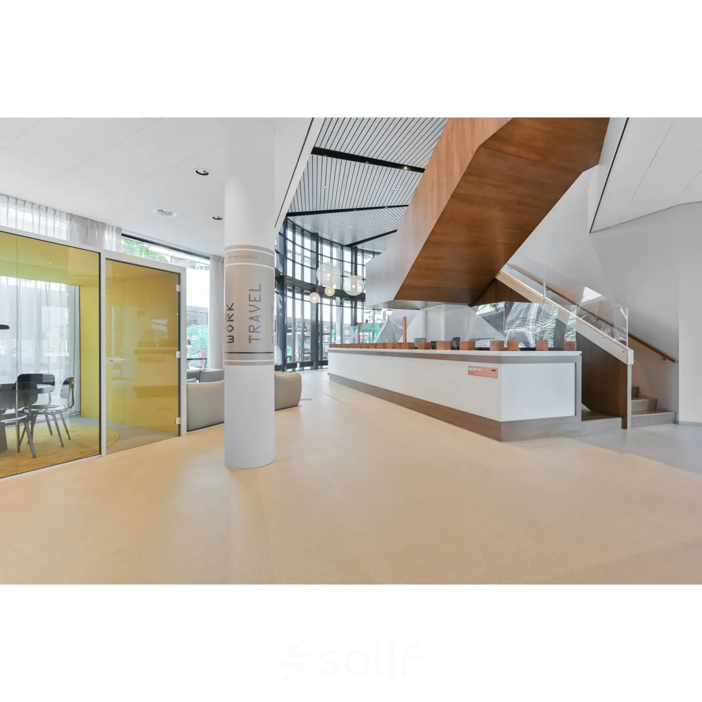 Modern office space with a sleek wooden staircase, yellow conference room, and spacious reception area at Weena 290, ideal for office space rental.