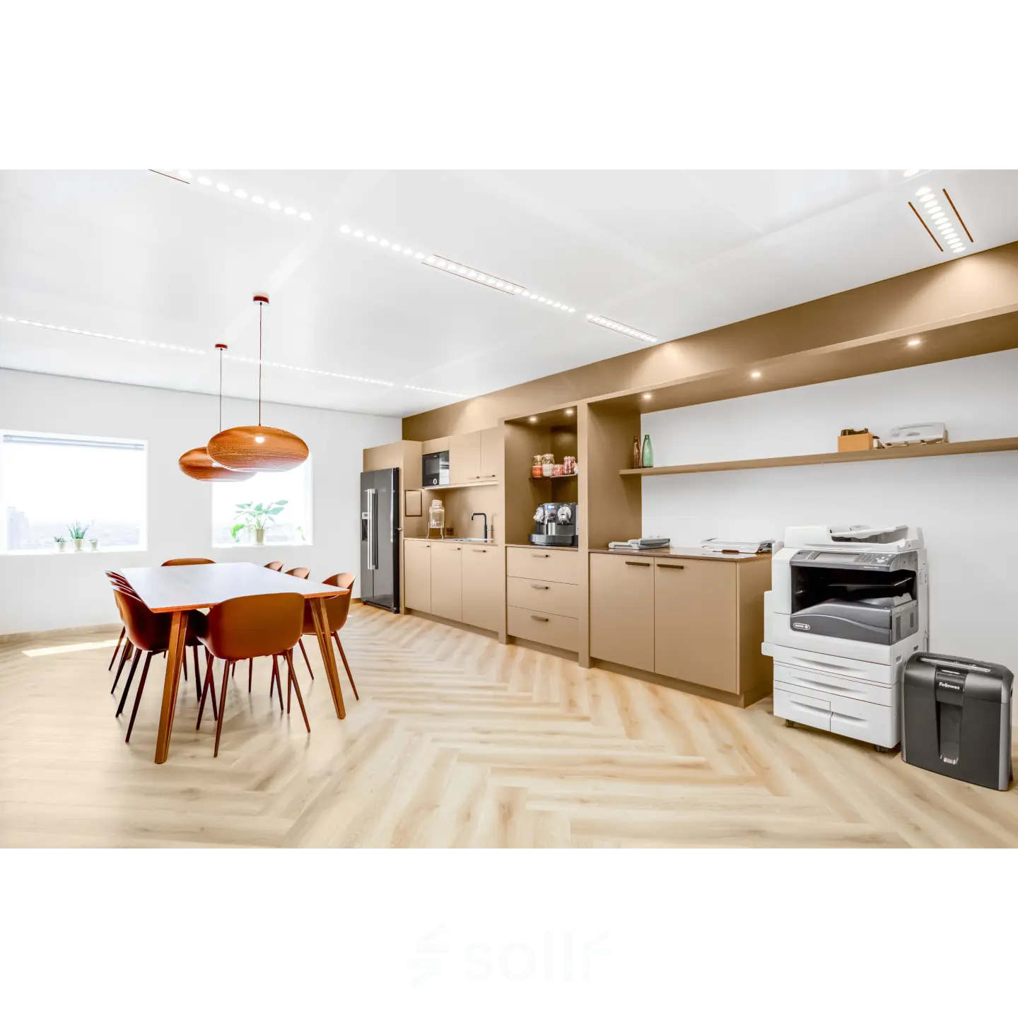 Furnished office space at Weena 505, Rotterdam Central Station, featuring a conference table, kitchenette, and equipment, ideal for office space rental.