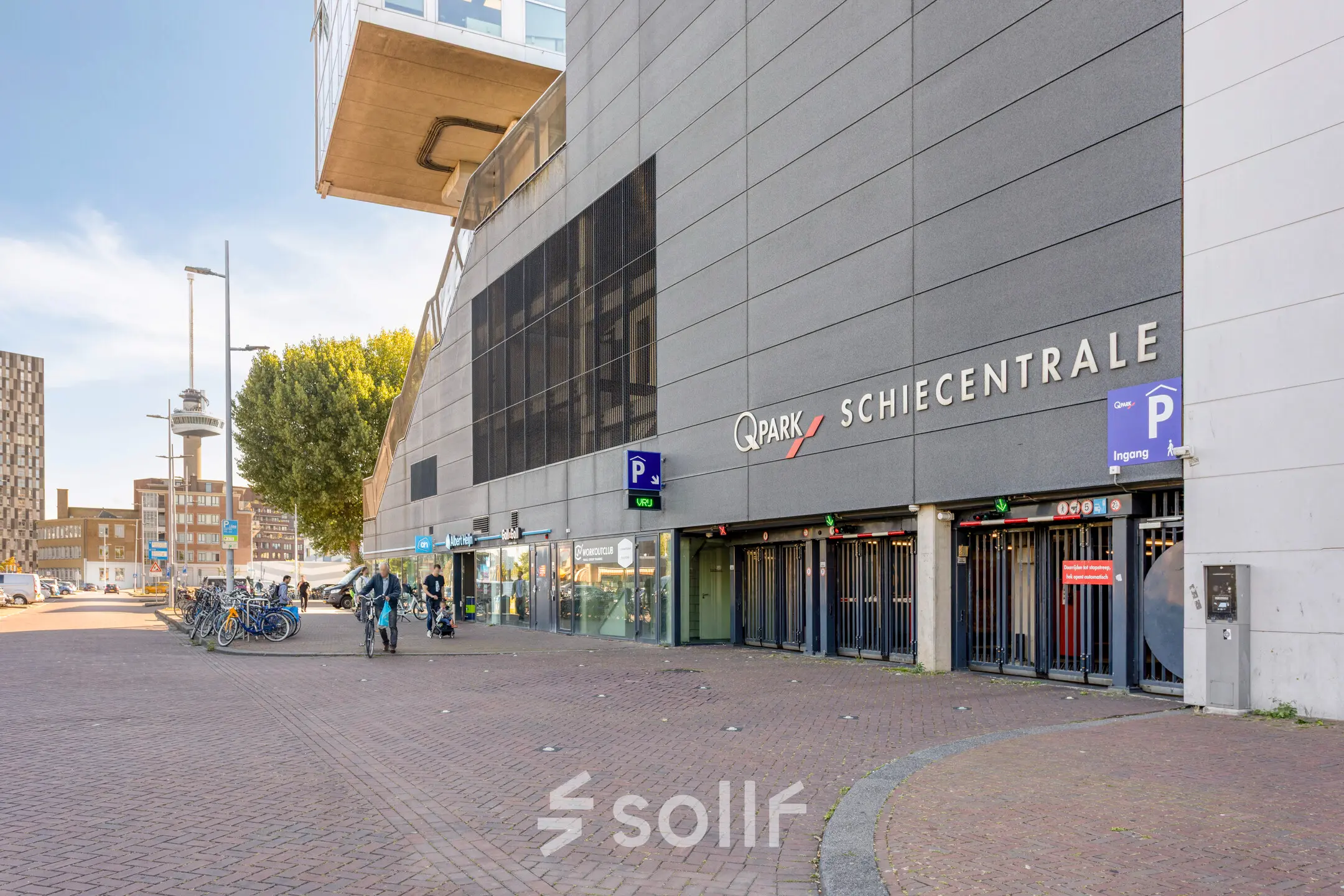 Exterior view of office building at Lloydstraat 21 B, Rotterdam Delfshaven, featuring accessible parking. Ideal location for those seeking office space rental.