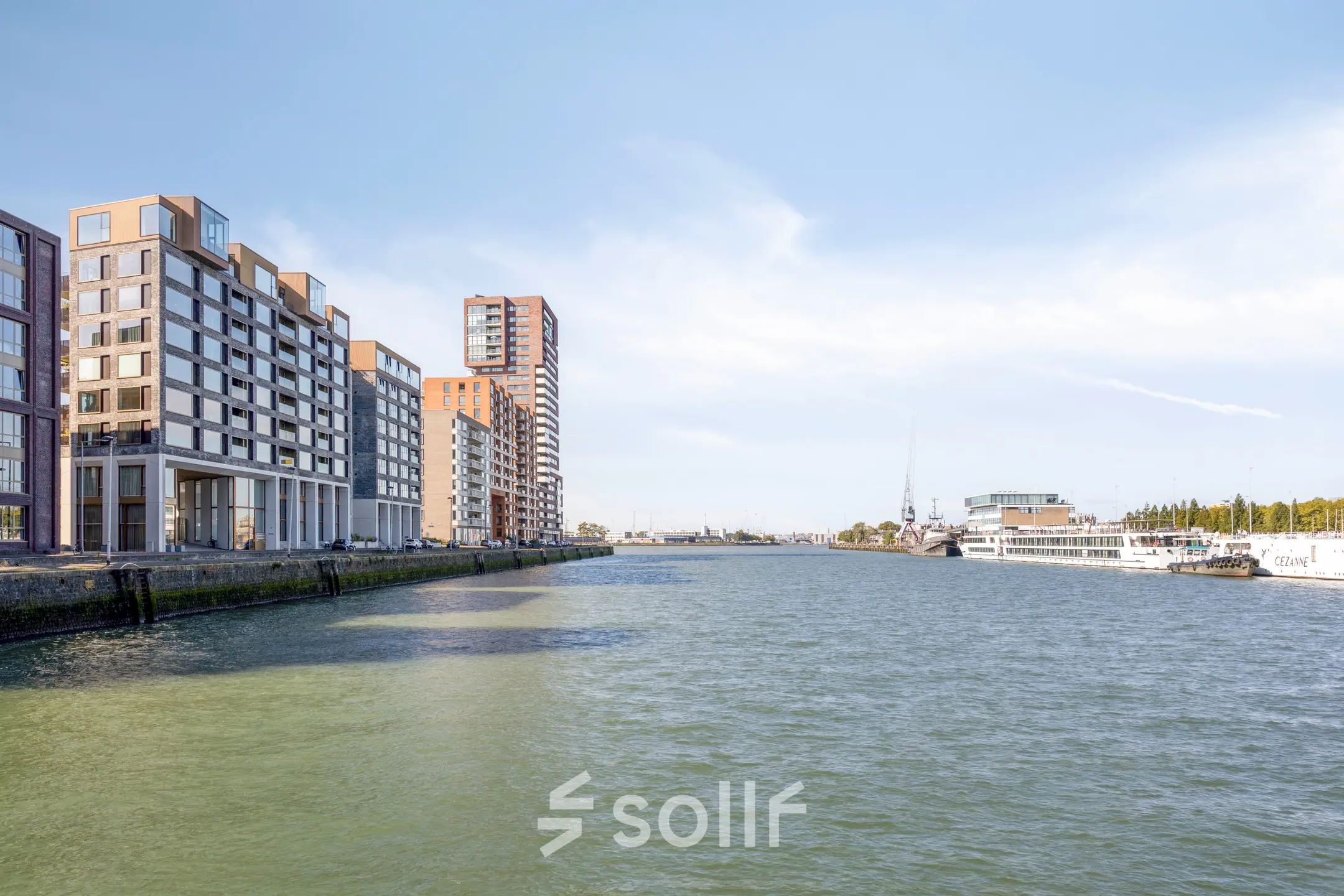 Exterior view of modern office buildings along the waterfront in Rotterdam Delfshaven at Lloydstraat 21 B, ideal for anyone looking to rent office space with a desirable location.
