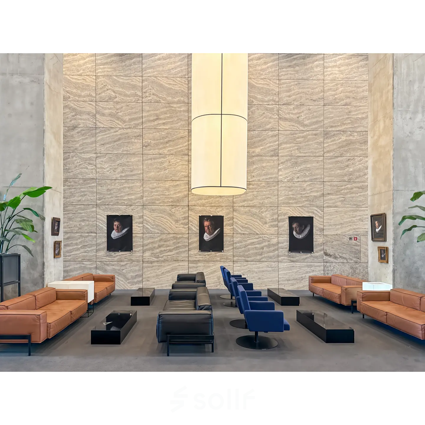 Modern furnished office lounge at Wilhelminakade 173, Rotterdam Kop van Zuid, featuring contemporary seating and stylish decor. Ideal for office space rental.