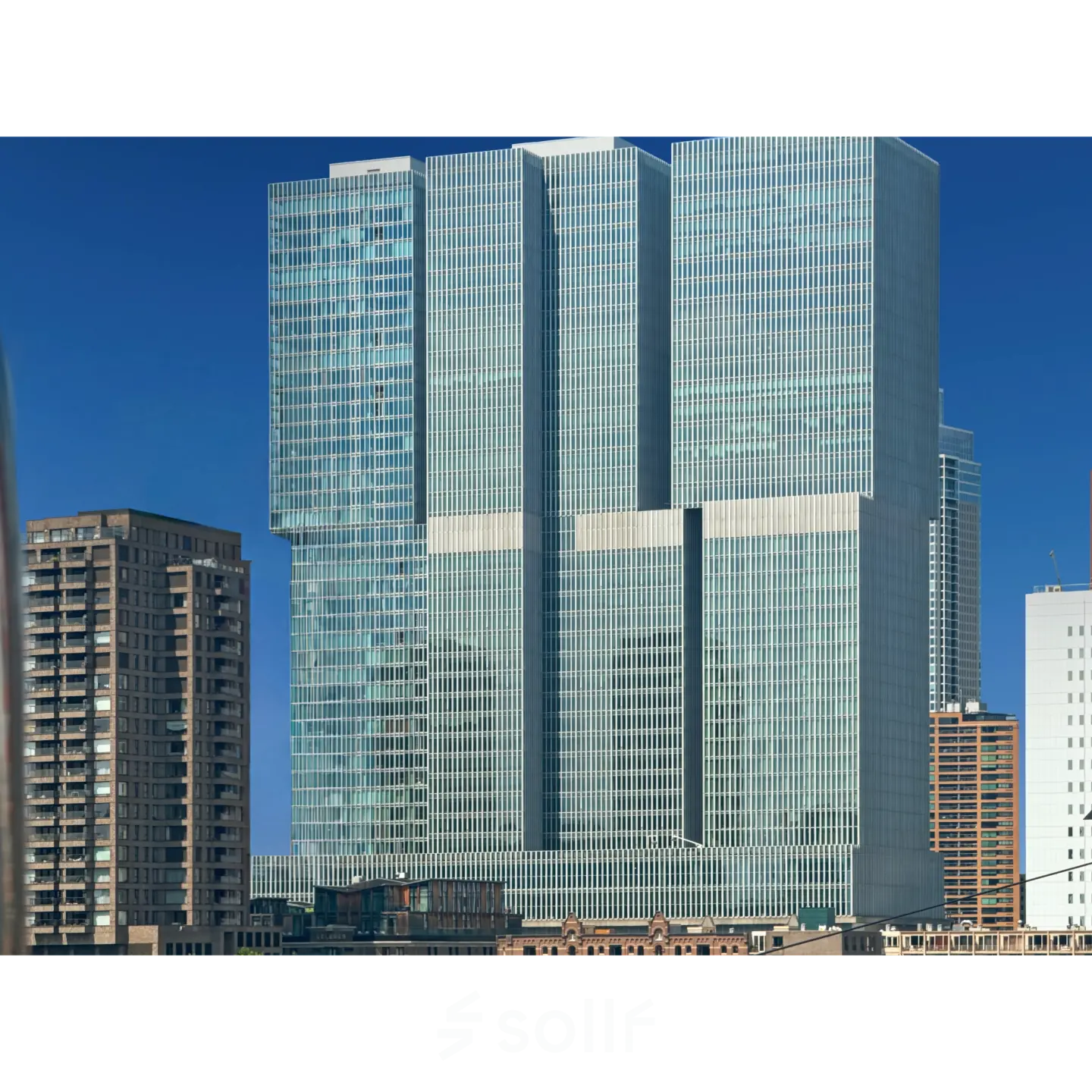 Modern high-rise building at Wilhelminakade 173 in Rotterdam Kop van Zuid, showcasing sleek architecture ideal for office space rental.