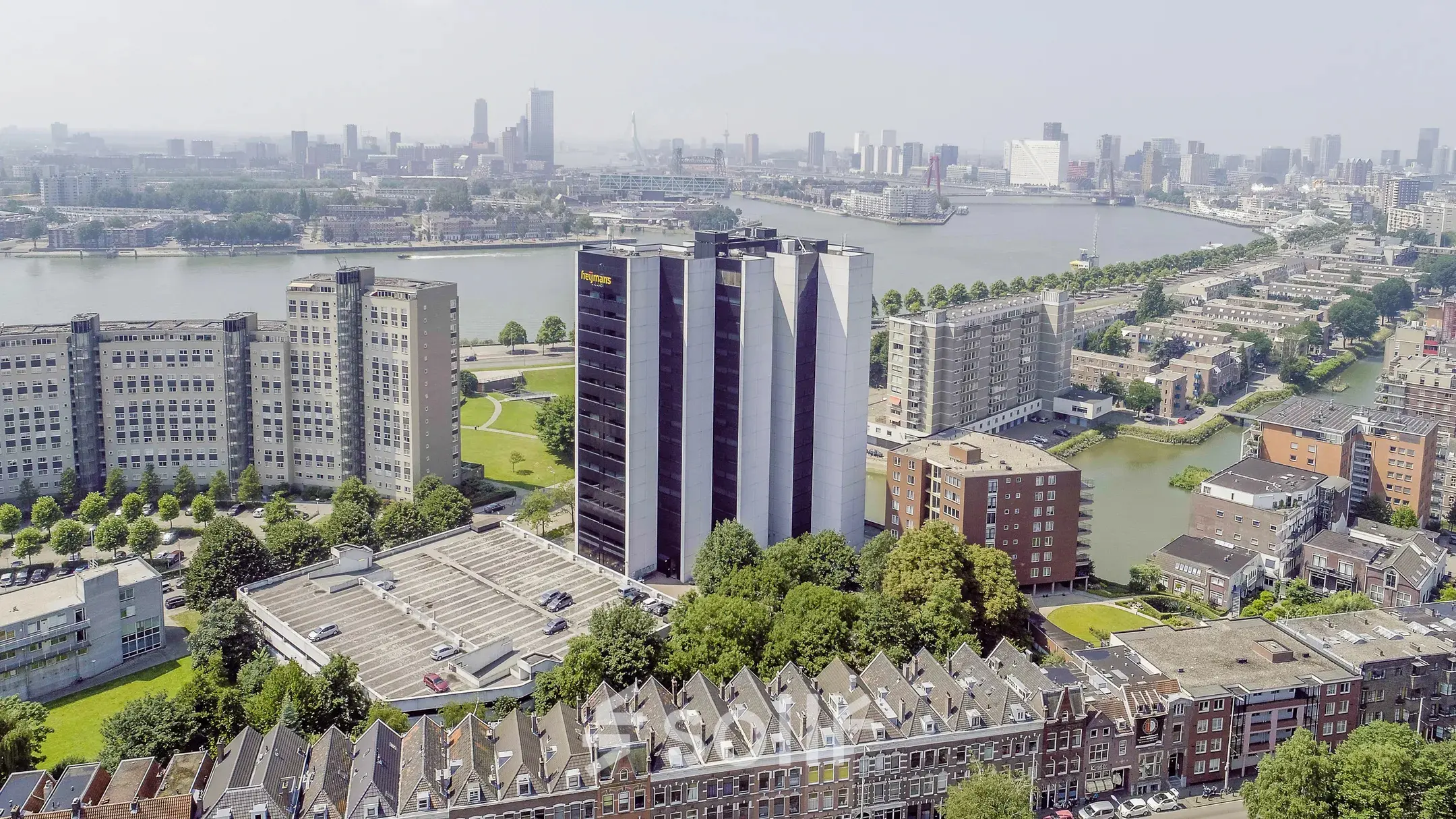 Aerial view of office buildings at Oostmaaslaan 71 in Rotterdam Kralingen, with river views.