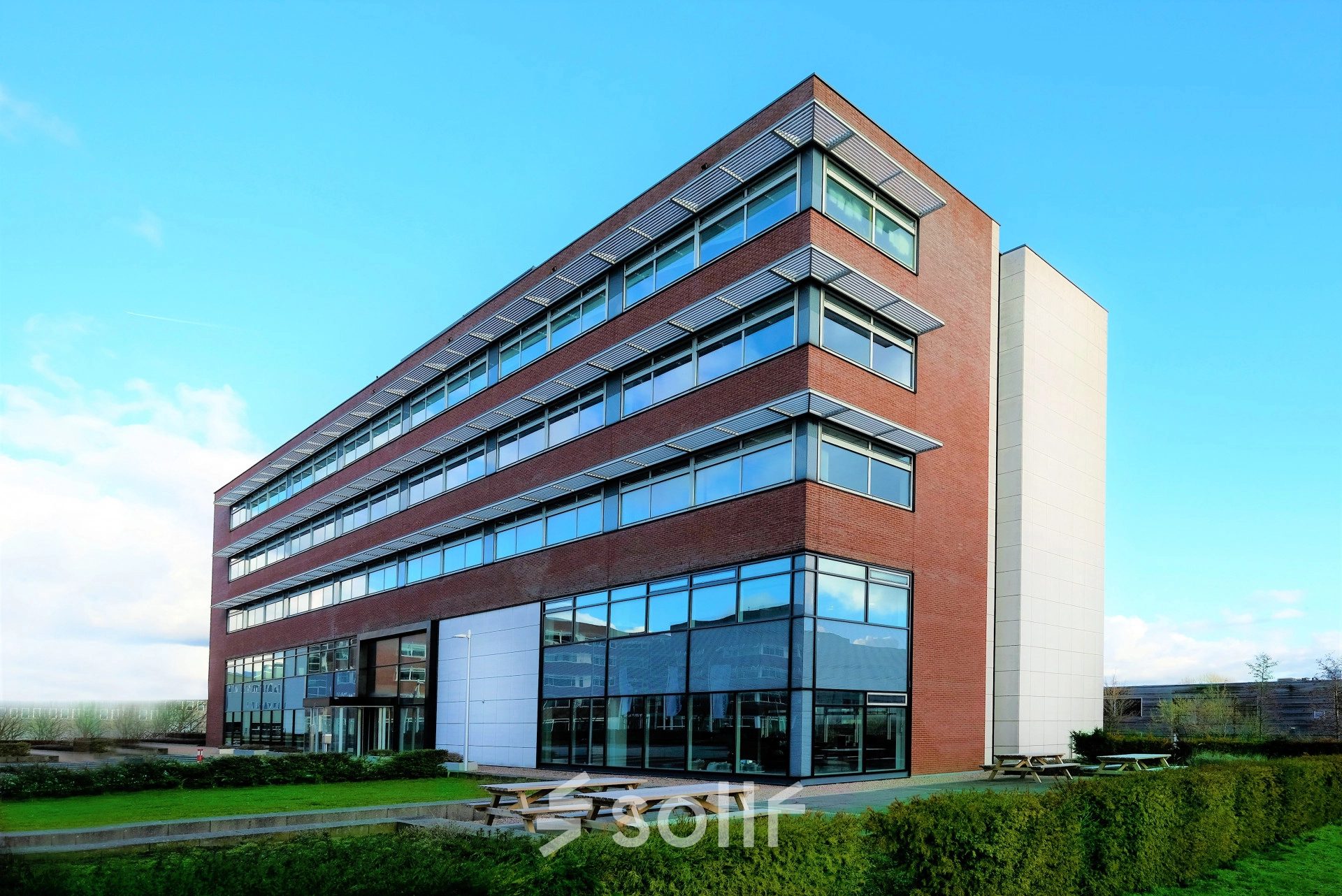 Exterior view of an office building at Tupolevlaan 81-99, Schiphol Rijk, highlighting a potential office space rental opportunity.