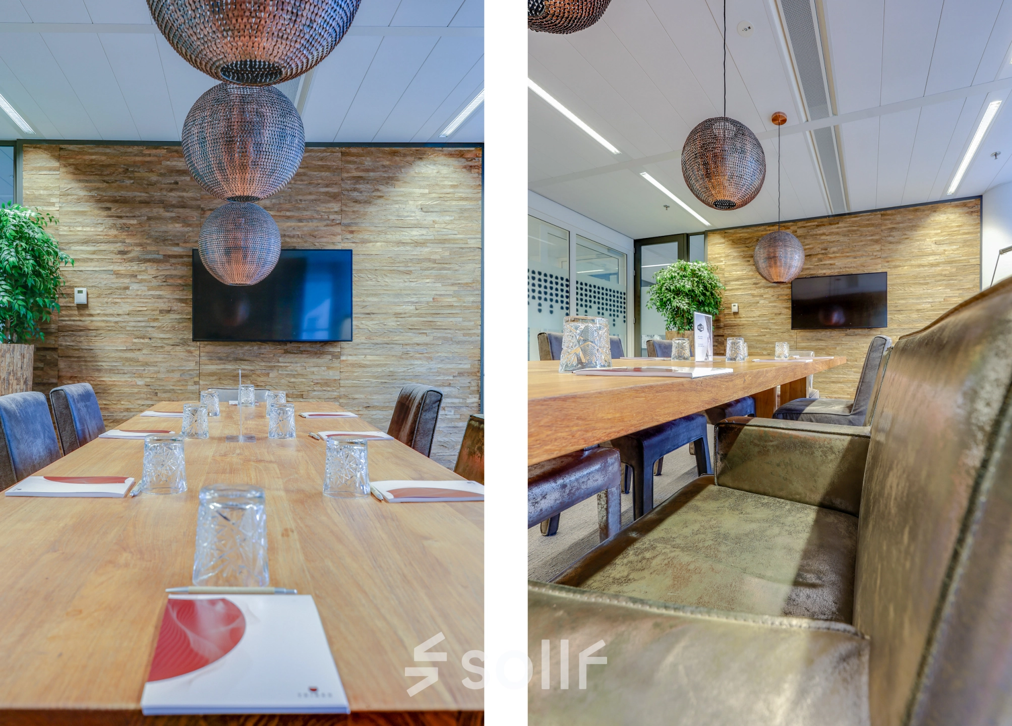 Spacious conference room at Kalvermarkt 53, The Hague Center, featuring a large wooden table, leather chairs, and decorative lighting. Ideal office space rental for meetings. TV mounted on textured wall.
