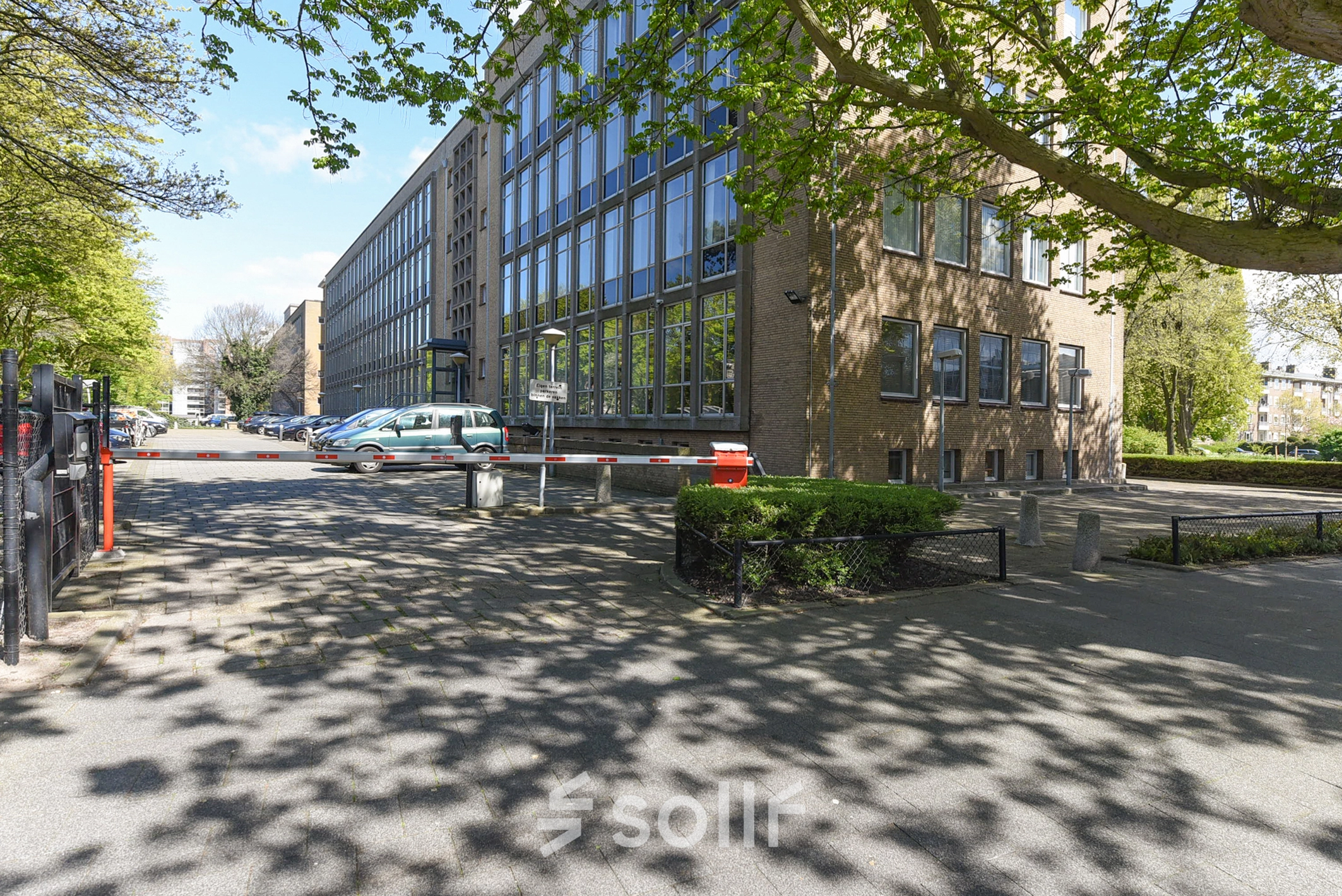 Exterior view of an office building on President Kennedylaan 19, The Hague Statenkwartier, ideal for office space rental.