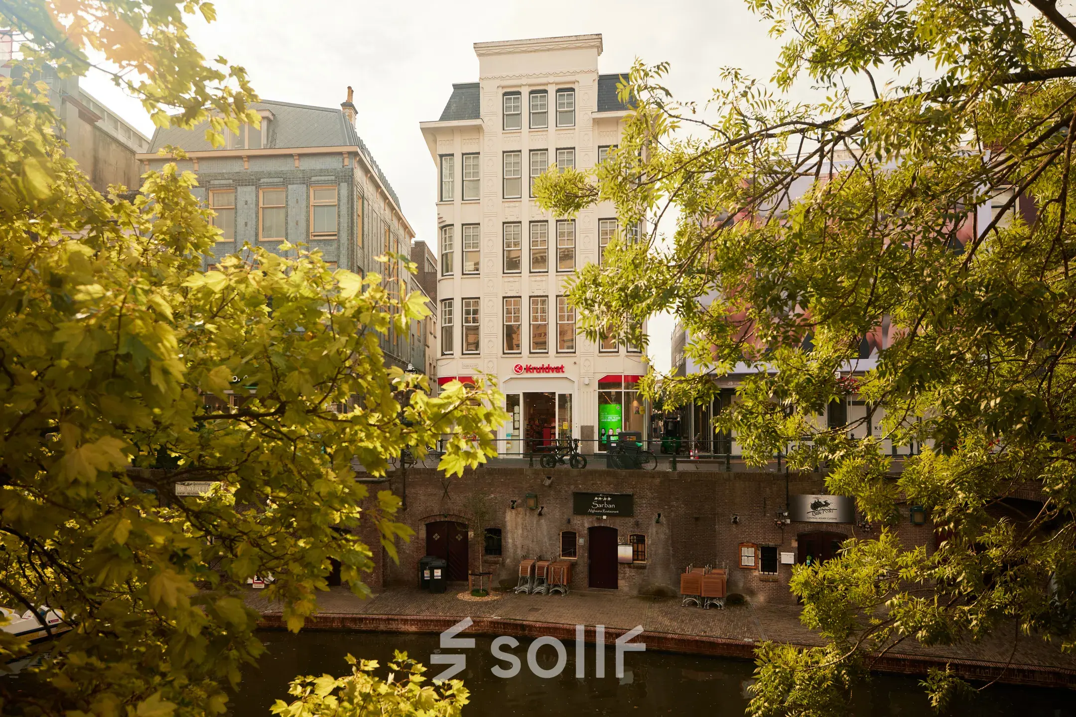 Exterior view of an office building at Oudegracht 161, Utrecht Center, suitable for office space rental.