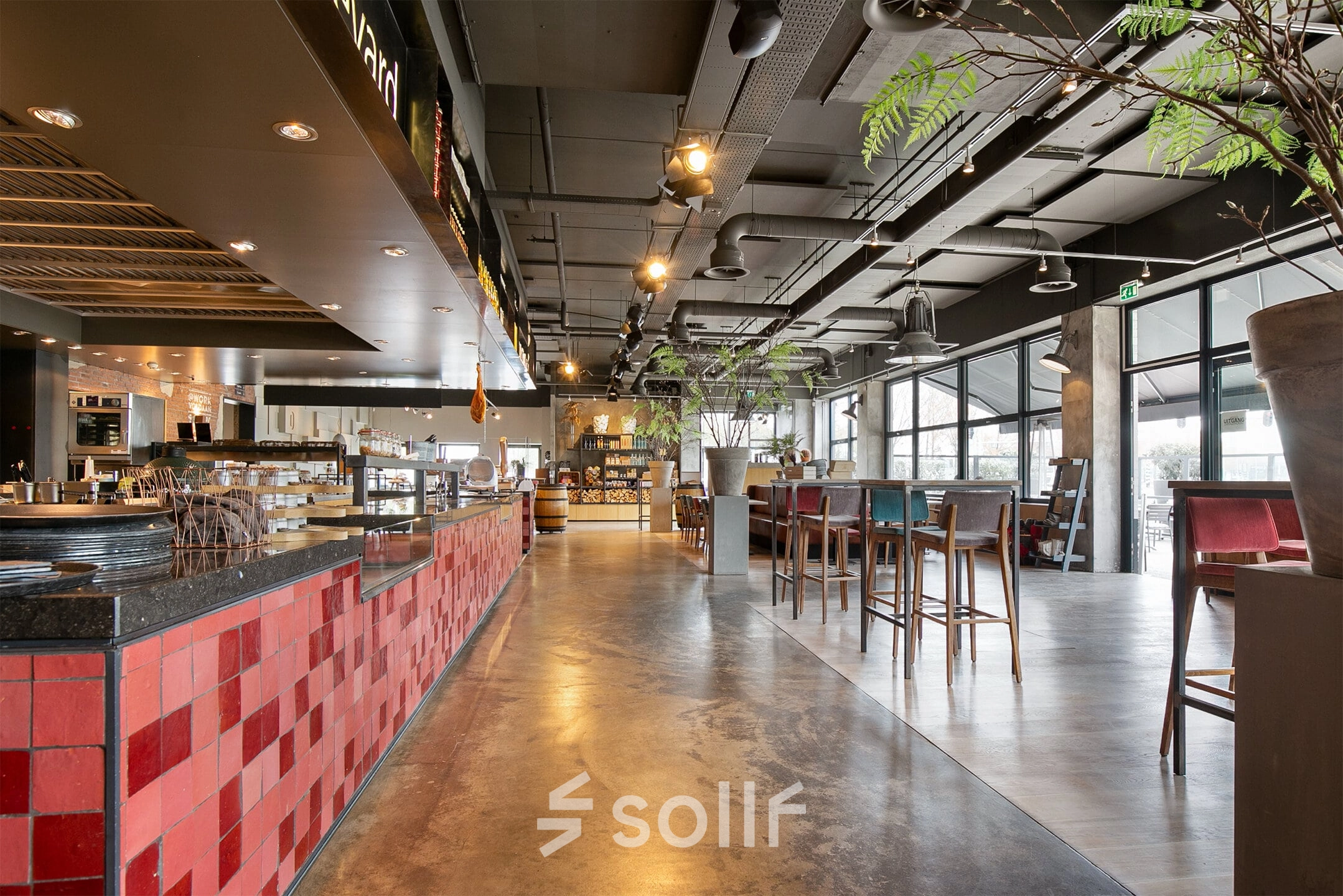 Spacious and modern office space rental at Atoomweg 63 in Utrecht Lage Weide, with stylish furnishings and ample seating ideal for collaborative work.