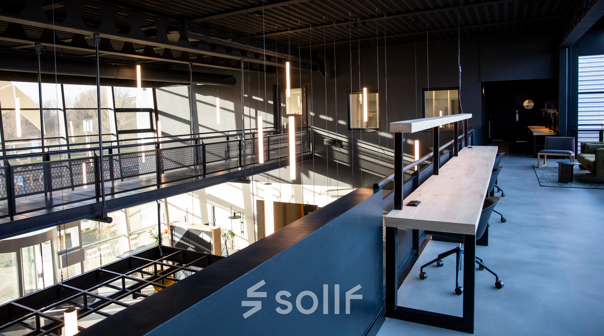 Spacious office to rent at Atoomweg 63, Utrecht Lage Weide, featuring modern workspaces with ample natural light and furnishings.
